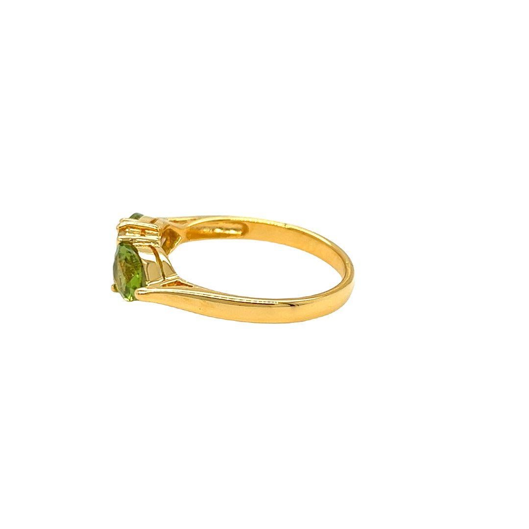 Nari Fine Jewels Twin Pear Shaped Peridot and Diamond Ring 14K Yellow Gold In New Condition For Sale In beverly hills, CA