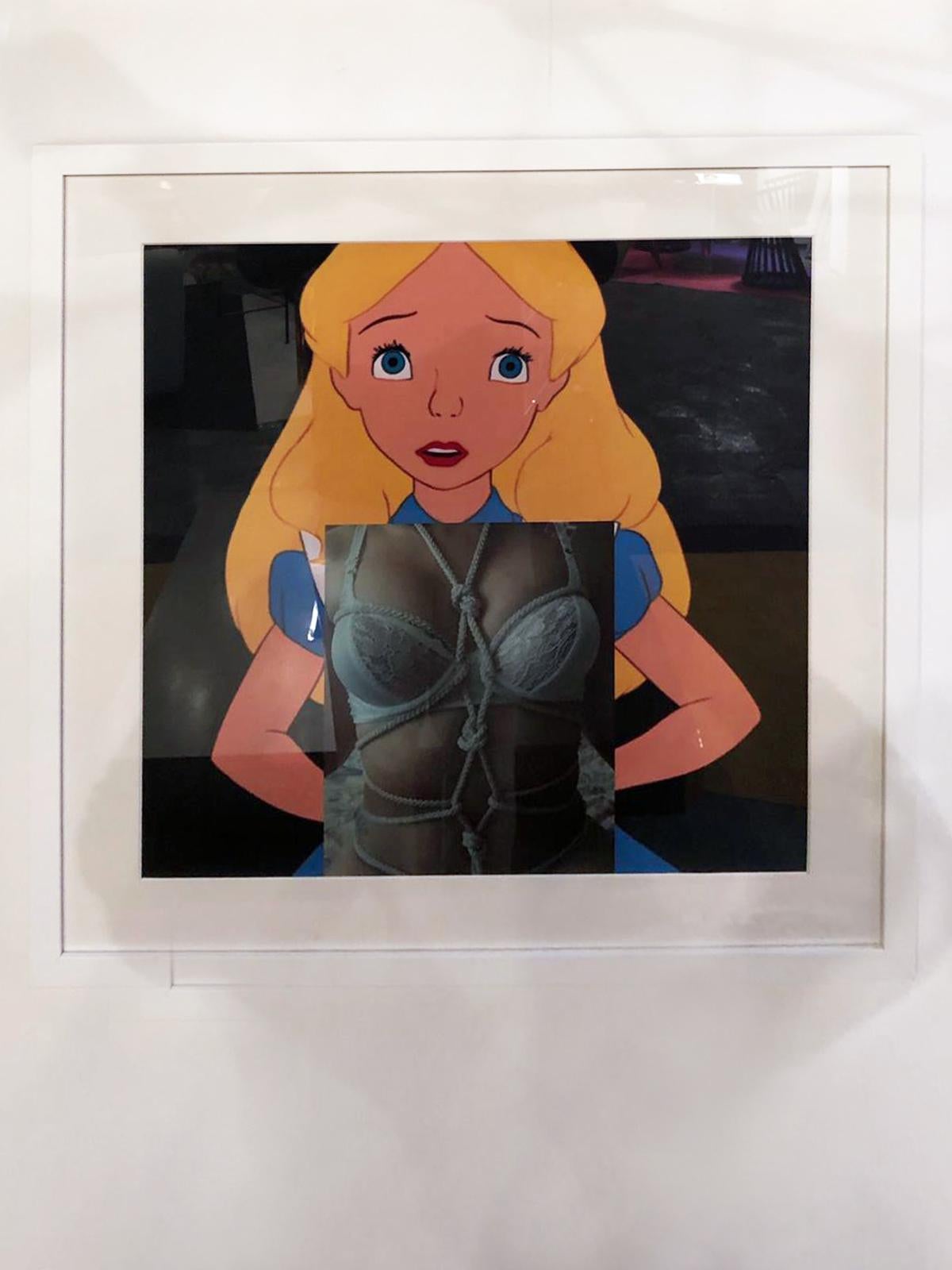 Disney's Alice in Wonderland + Bondage digital collage print by Spanish artist Naro Pinosa, made famous in social media. Unique signed-by-artist piece. Authenticity certificated.
Print on photography papper. Glass and white lacquered wooden frame.