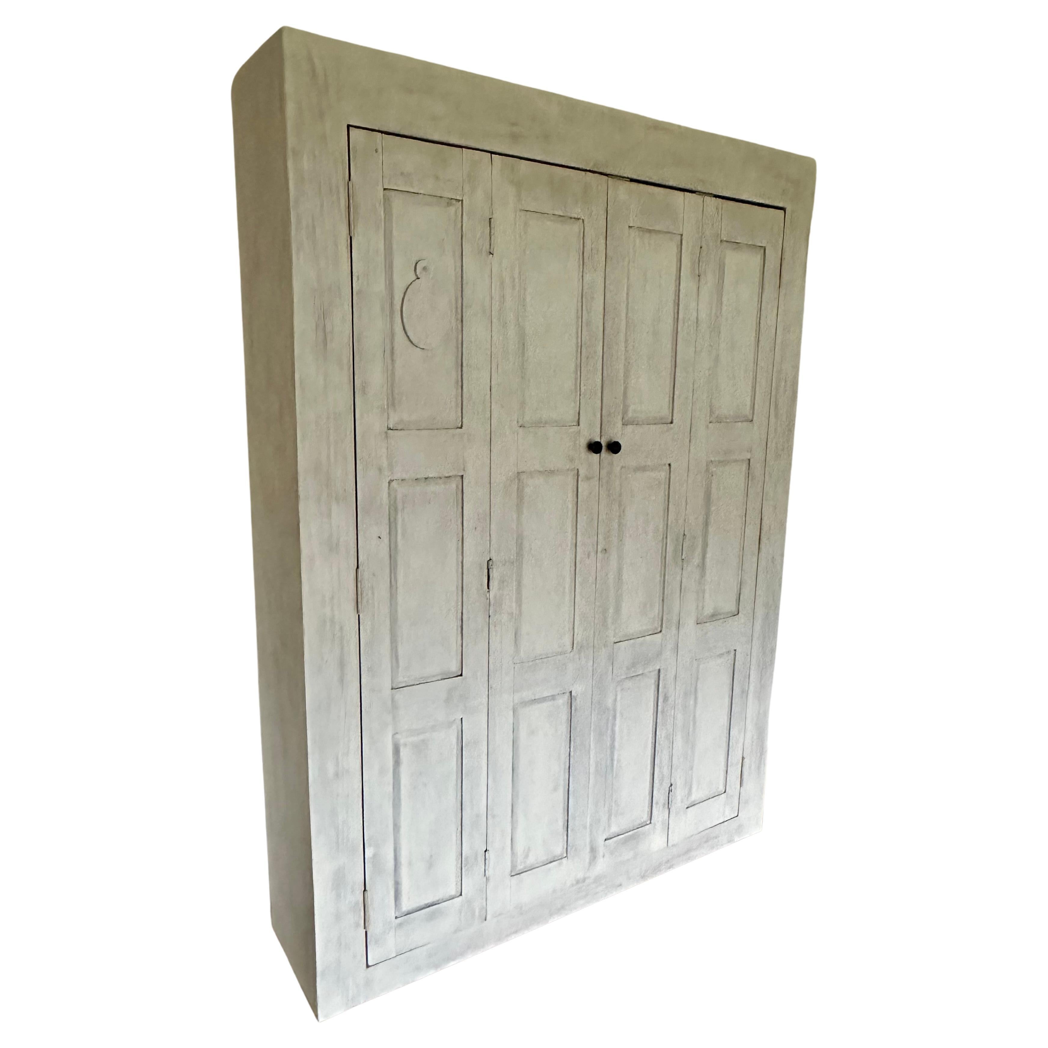 narrow cupboard with doors