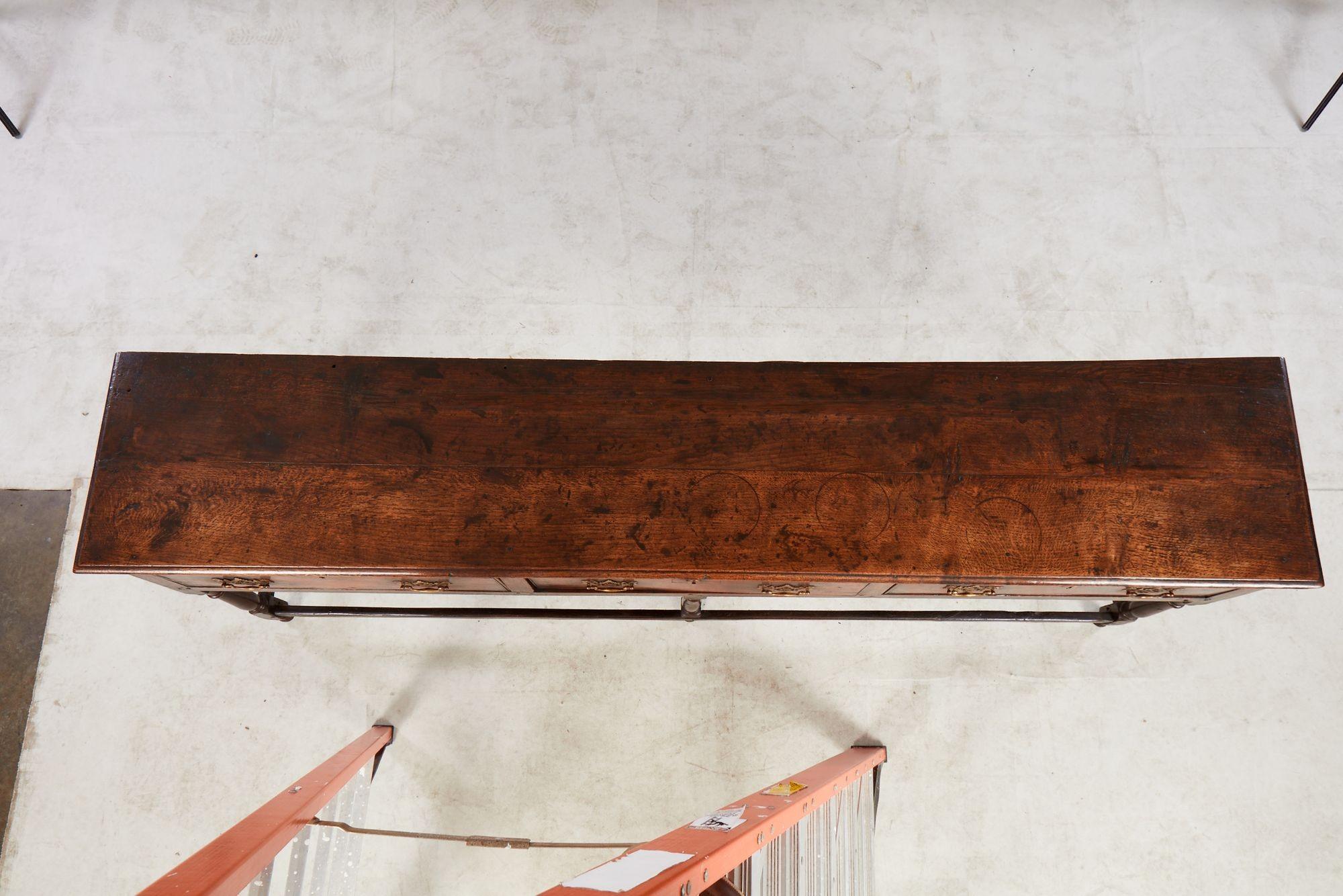 Mid-18th Century Narrow 18th c. Well-Patinated English Oak Sideboard For Sale