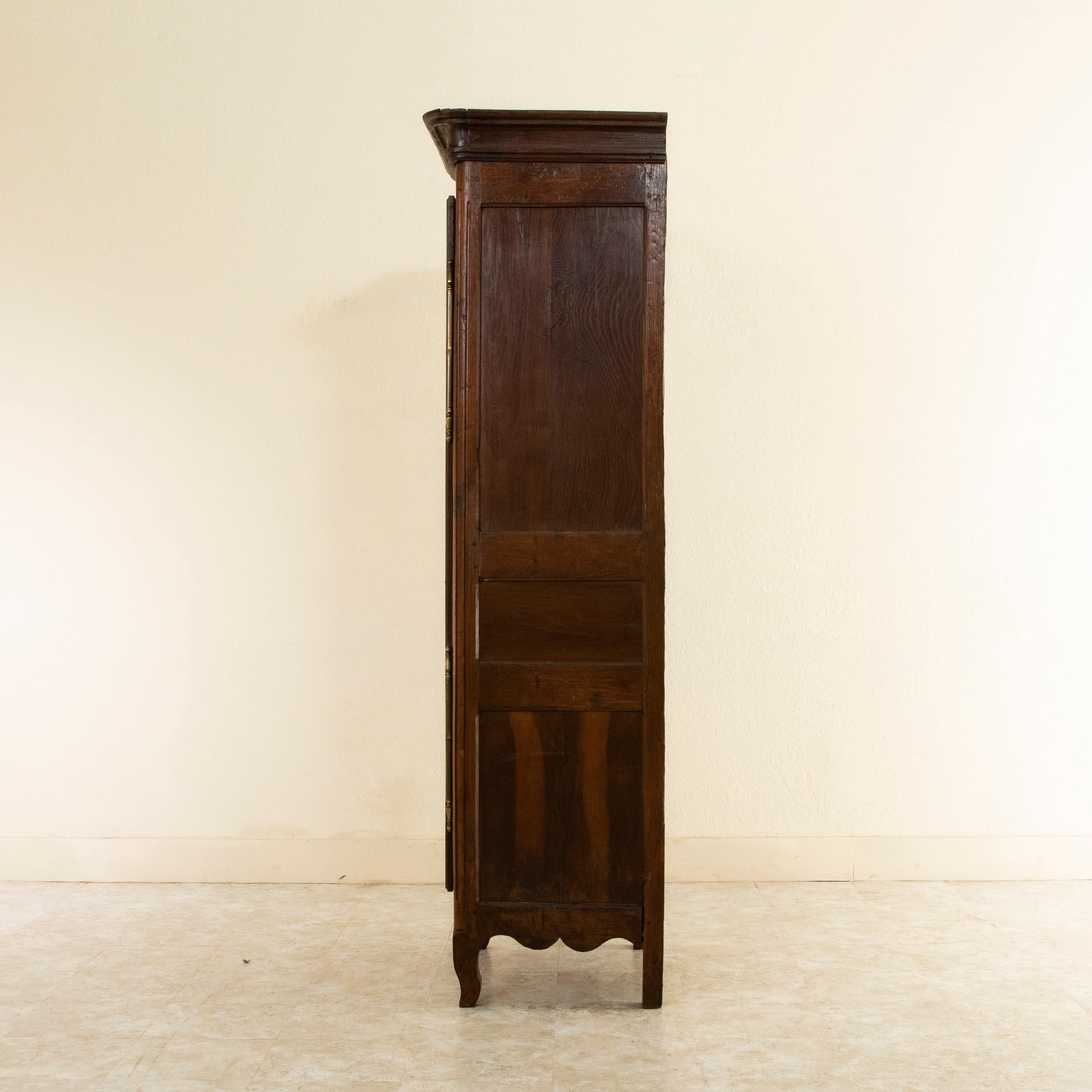 Hand-Carved Narrow 19th Century French Hand Carved Oak Bonnetiere or Cabinet from Normandy