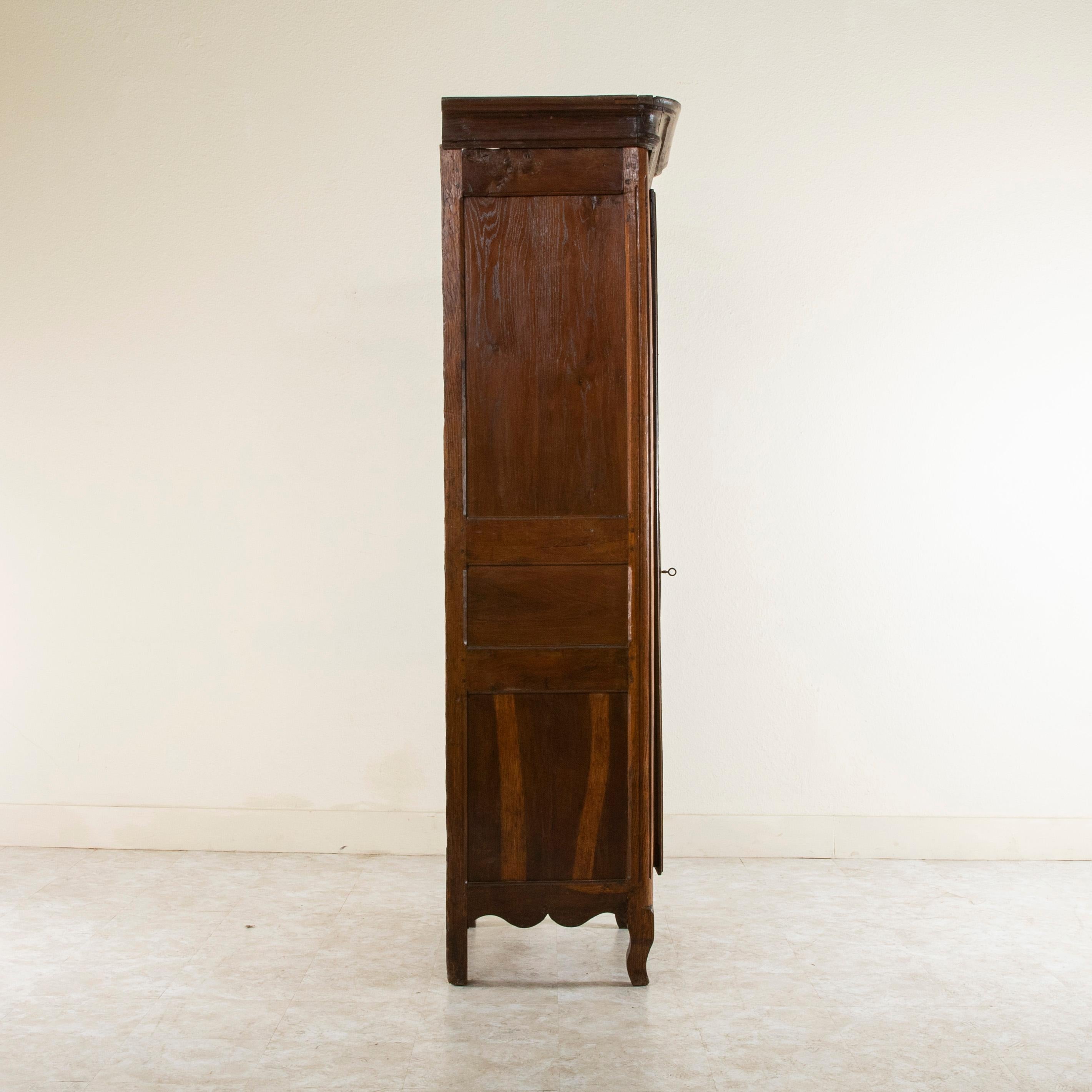 Bronze Narrow 19th Century French Hand Carved Oak Bonnetiere or Cabinet from Normandy