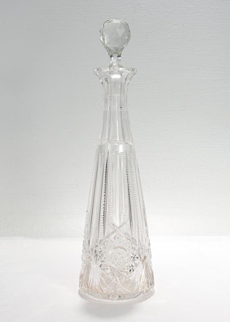 A fine antique ABP cut glass decanter.

With a tapered neck, wheel cut panels, and hobstars to the body.

With an associated stopper (we are unsure if this is the original stopper).

Simply a wonderful cut crystal decanter!

Date:
Early