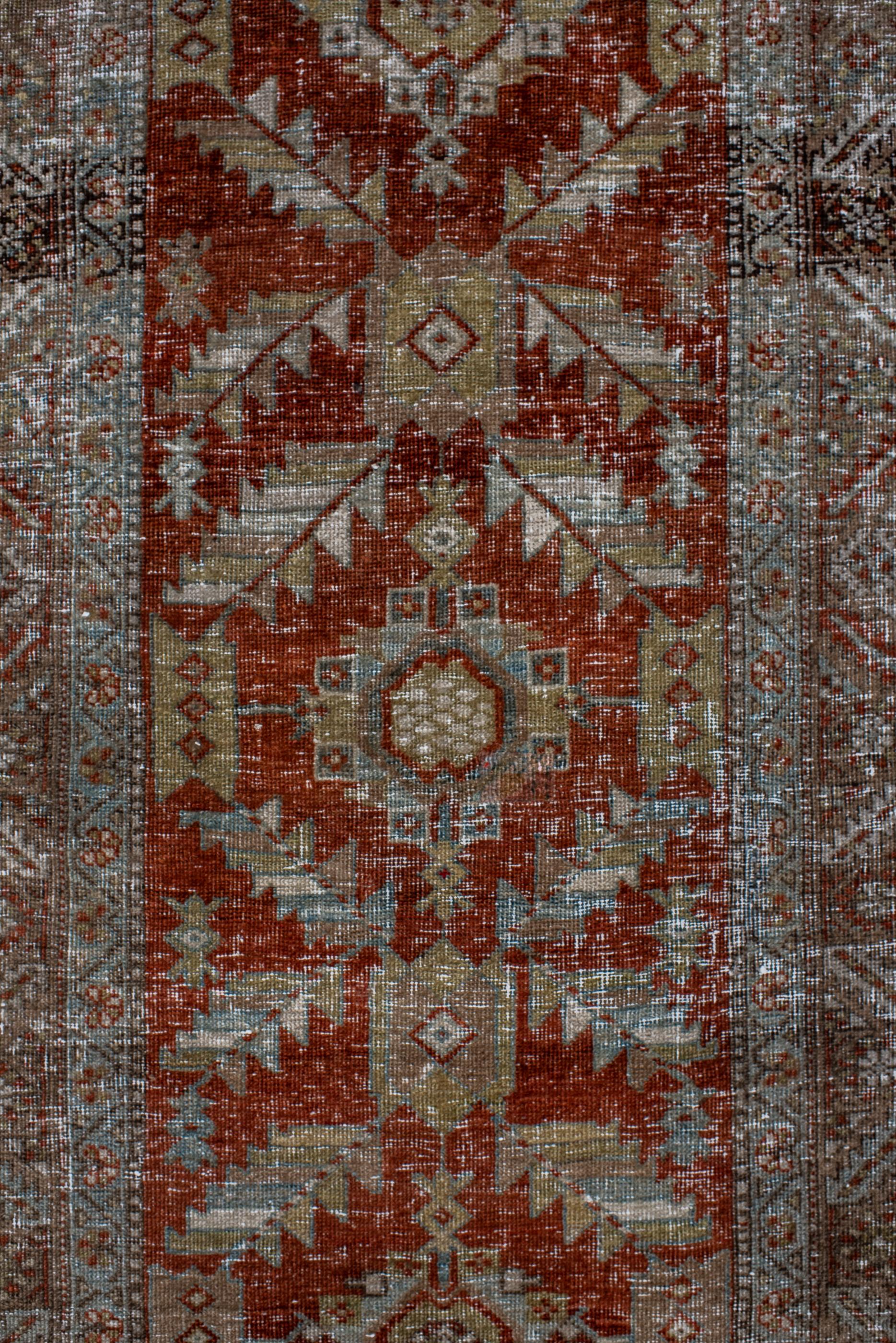 Hand-Knotted Narrow Antique Heriz Runner with Red Field  For Sale