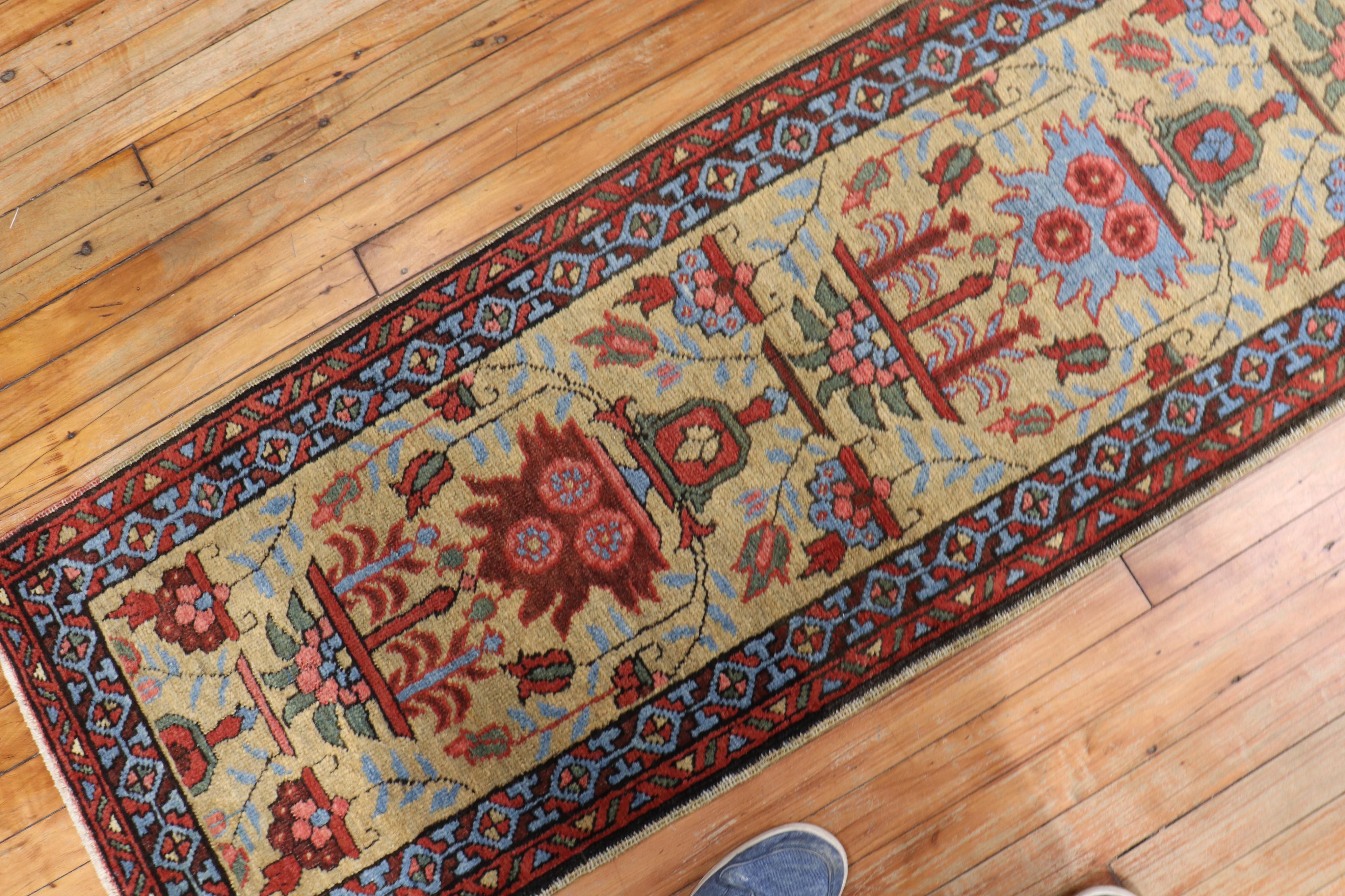 A narrow Persian Heriz runner from the 2nd quarter of the 20th century.

Measures: 1'11” x 9'.