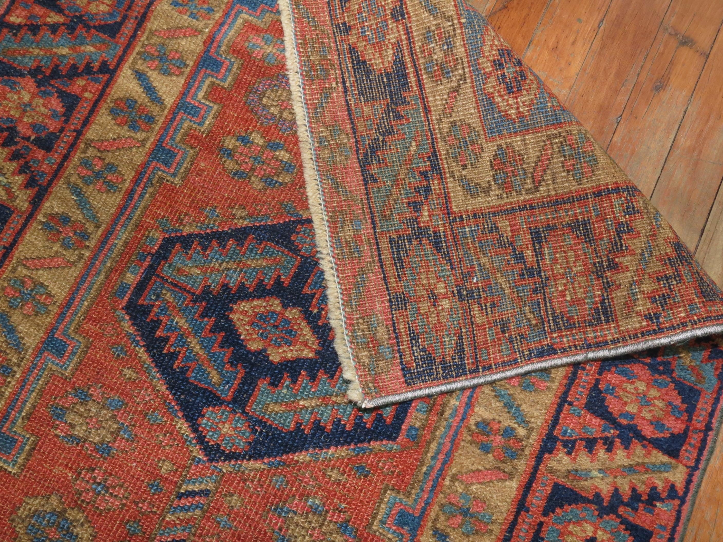 A one of a kind decorative antique Persian Heriz runner.

With distinctive large scale motifs and a wide ranging palette of warm colors, the antique Heriz carpet is probably the most popular of the Persian village carpets. In constant, increasing