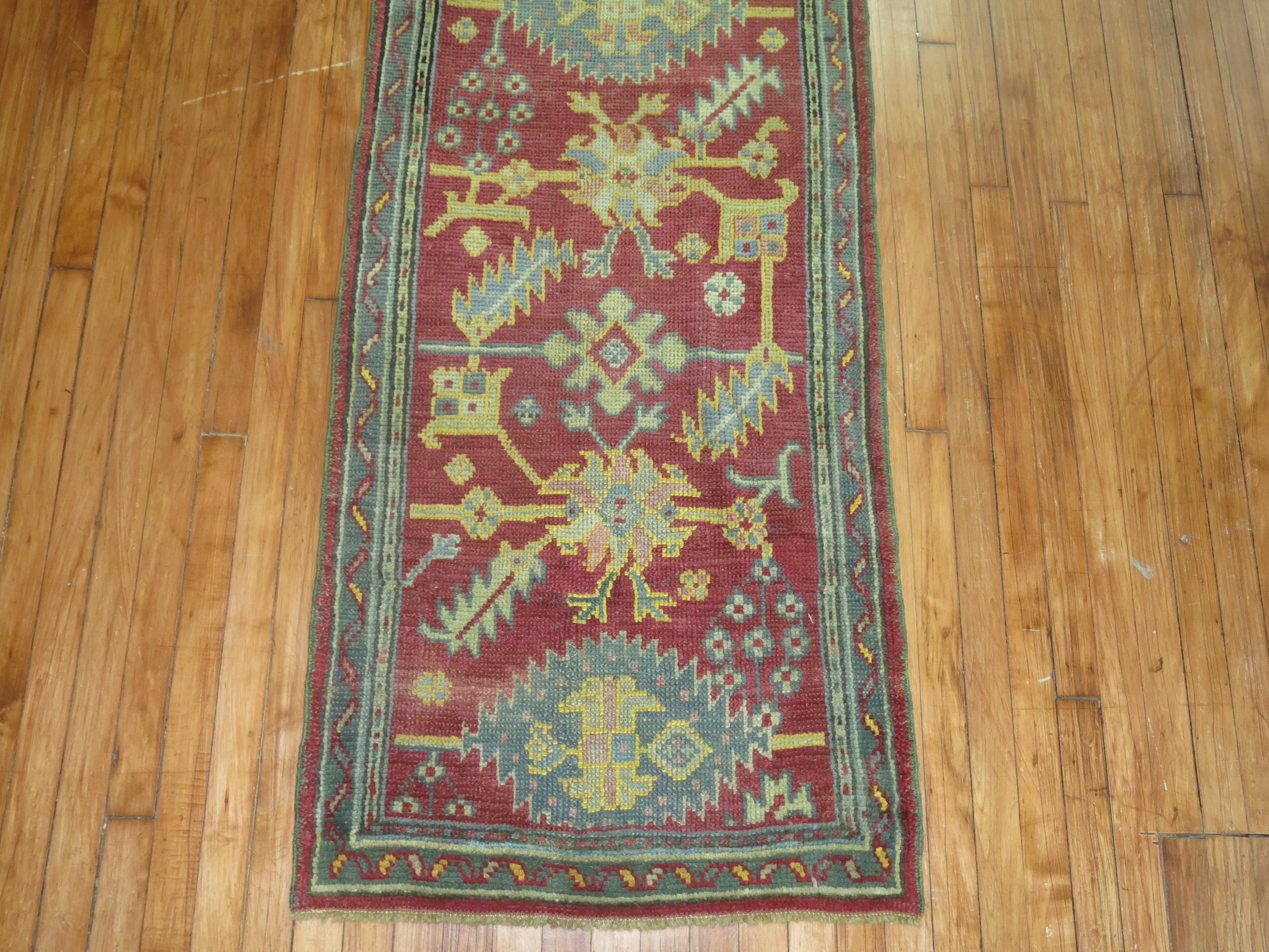 Hand-Knotted Narrow Dark Antique Red Oushak Runner For Sale