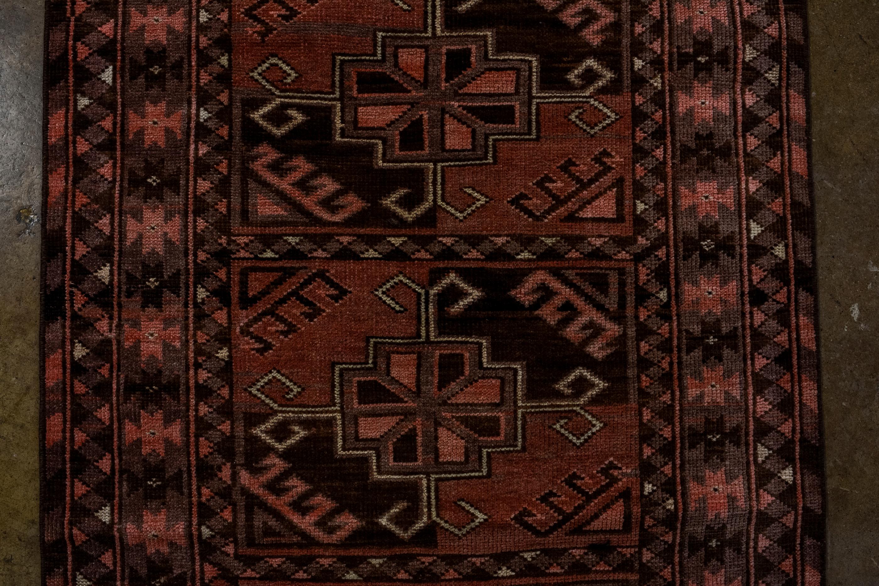Narrow Ersari Runner with Rusty Beige and Chocolate Colors, Circa 1930's In Good Condition For Sale In New York, NY