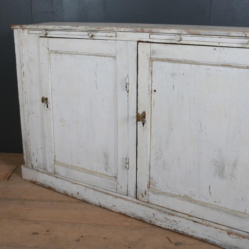 Narrow French 19th century original painted enfilade. Lovely worn old white paint, 1820.

Dimensions:
95.5 inches (243 cms) wide
14.5 inches (37 cms) deep
39 inches (99 cms) high.

 