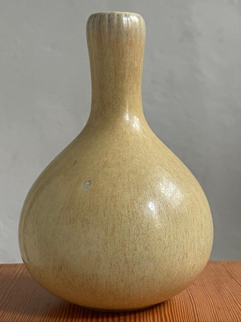 Ceramic Narrow long necked vase in yellow glaze by Eva Stæhr Nielsen for Saxbo, Denmark For Sale