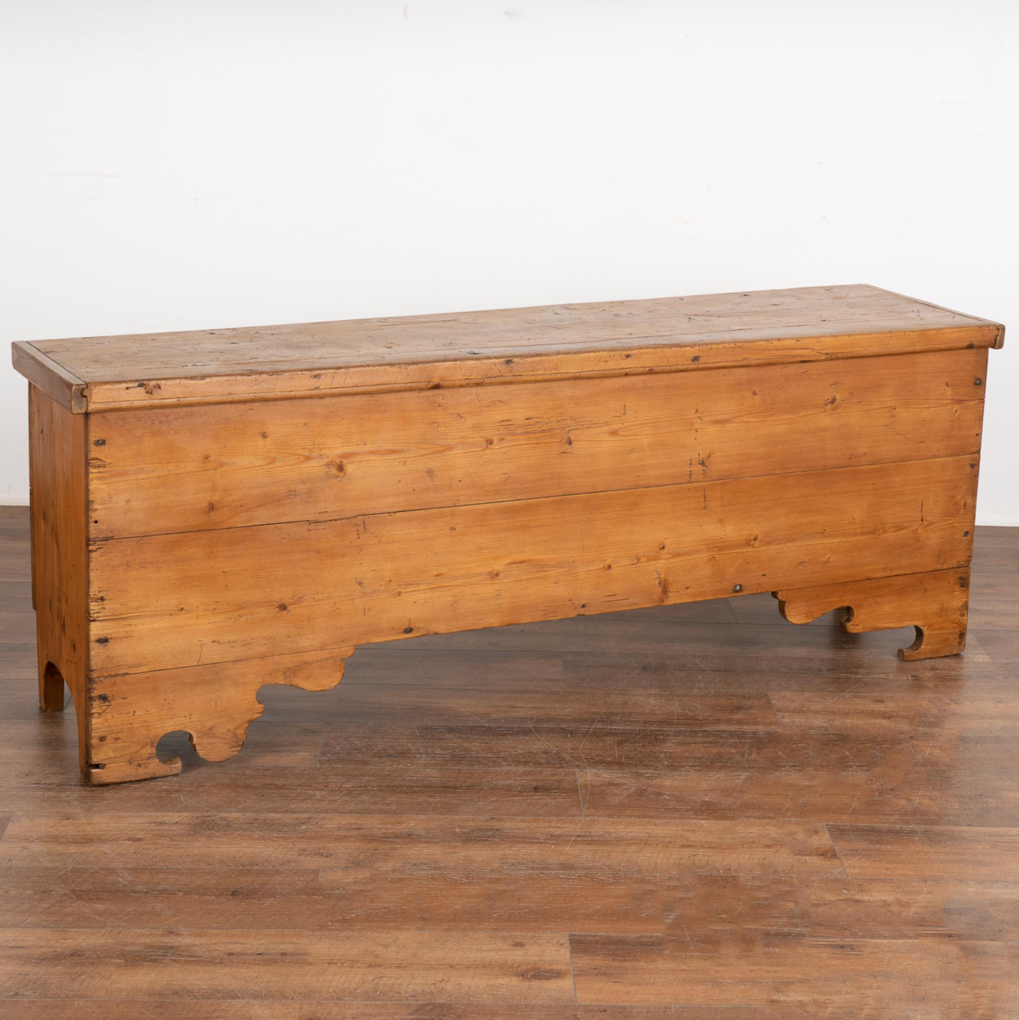 This delightful long narrow trunk came from the Swedish countryside. The pine has grown warmer with a deep patina that comes only from the passage of years and use. 
Due to the depth of 17.5