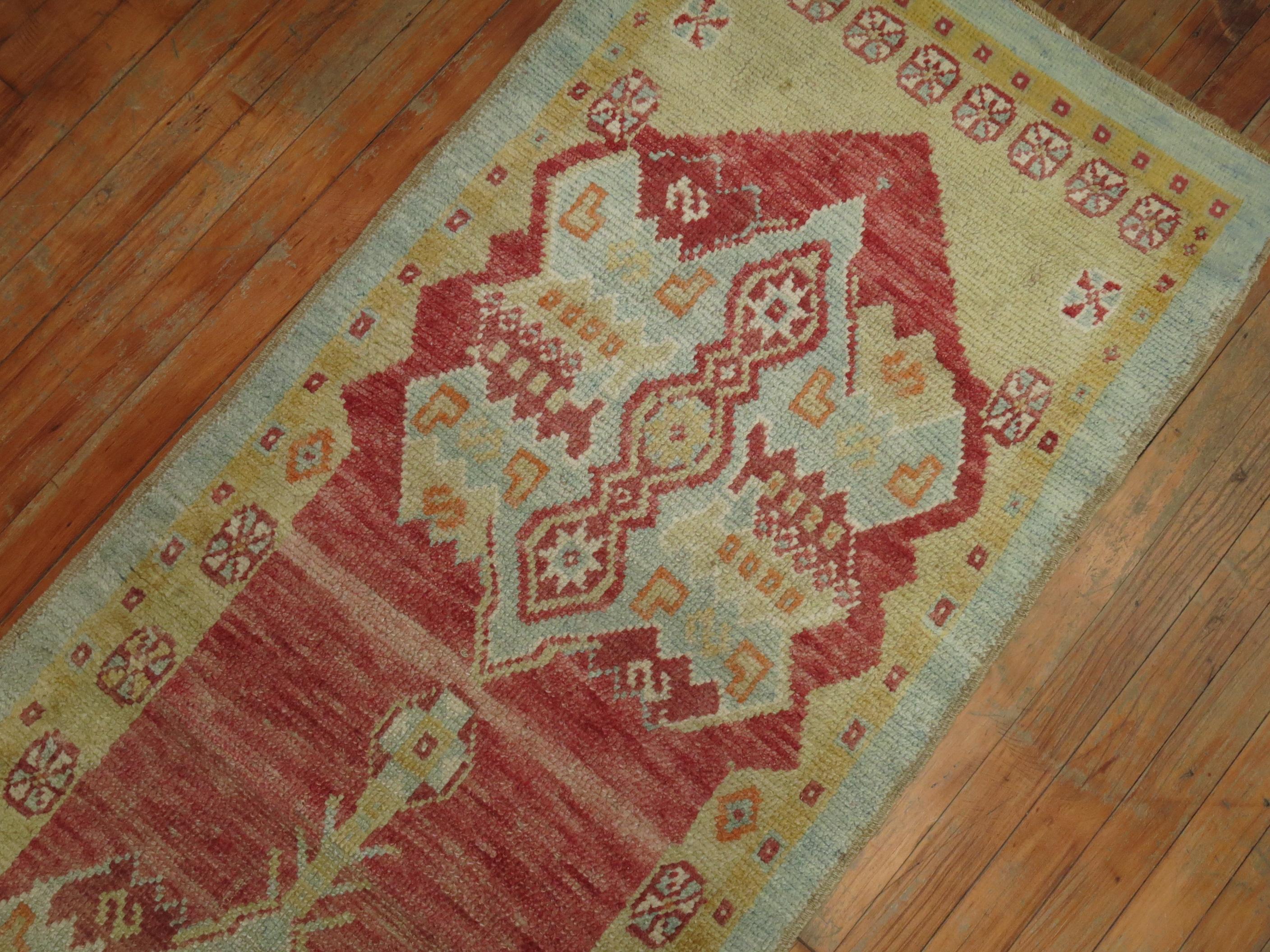 A mid-20th century Turkish Oushak runner. Pleasant color combo and contrast.