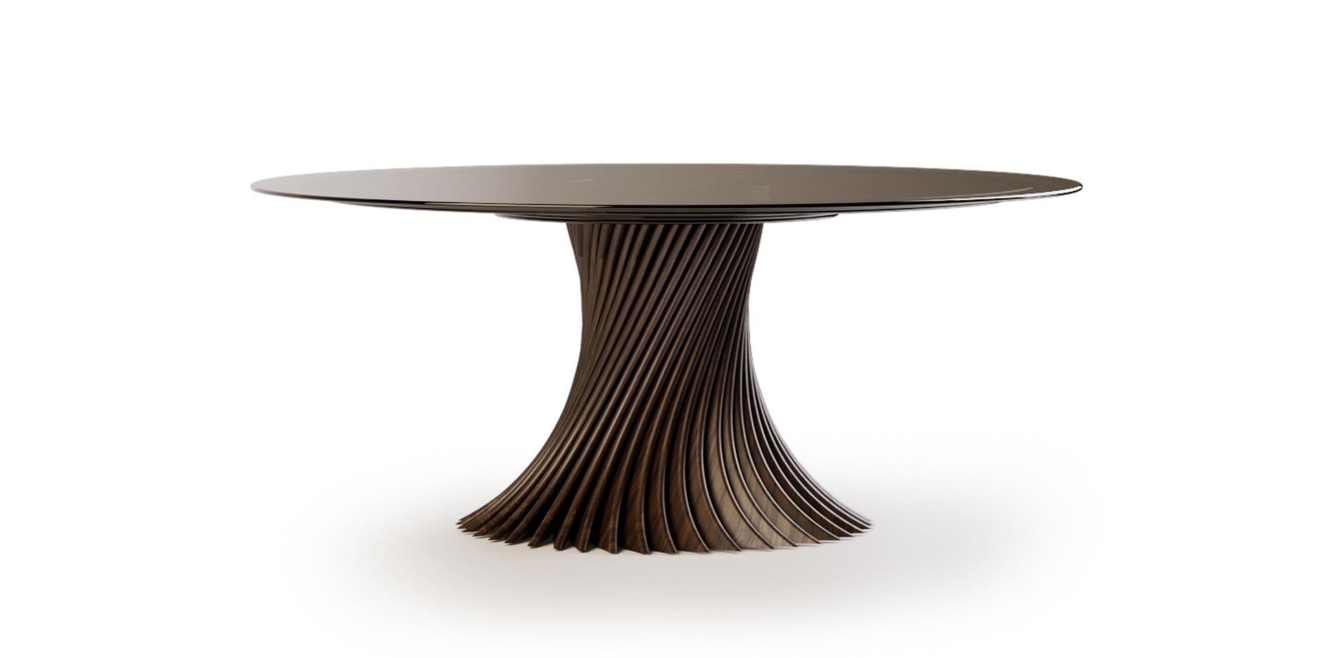 Naruto is an exclusive dining table that features remarkable construction details and materials. Its sublime lines are appropriate for modern decor and in any unique and sophisticated dining room environment.