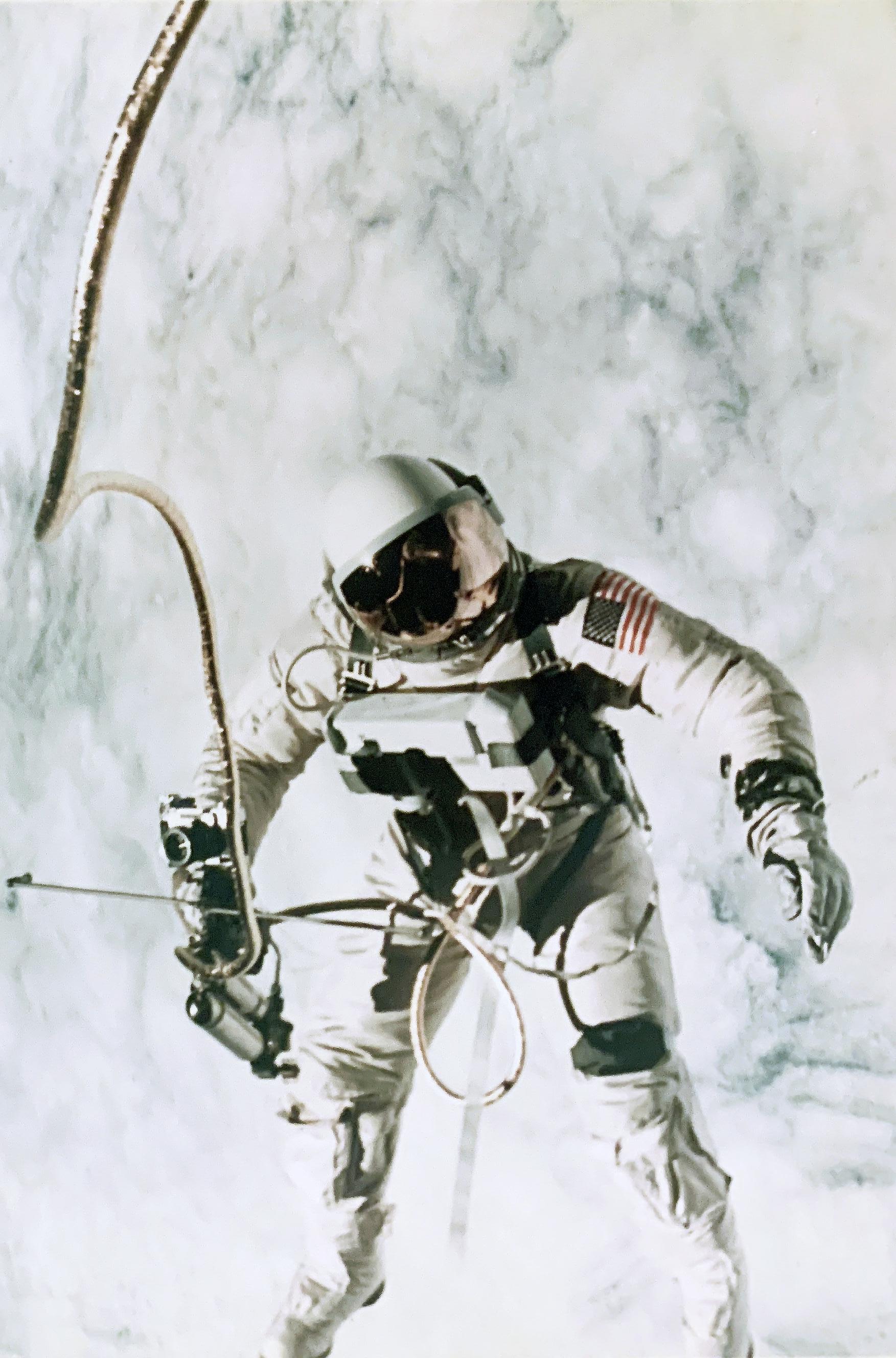 First US Spacewalk: Ed White EVA over the cloud-covered Pacific Ocean, Gemini 4 - Photograph by NASA