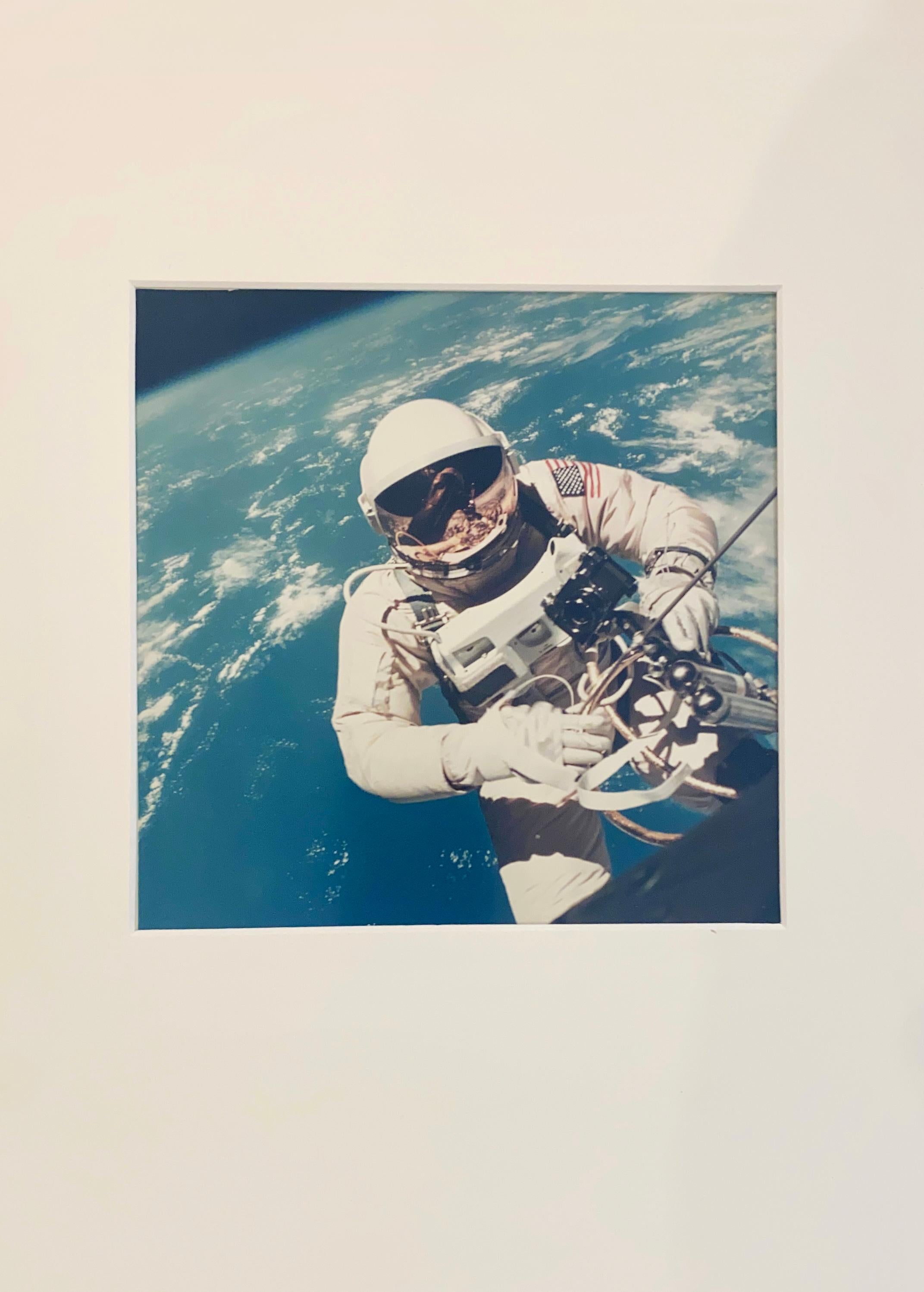 Historic First Photograph of Man in Space: Ed White spacewalking over Hawaii - Gray Color Photograph by NASA