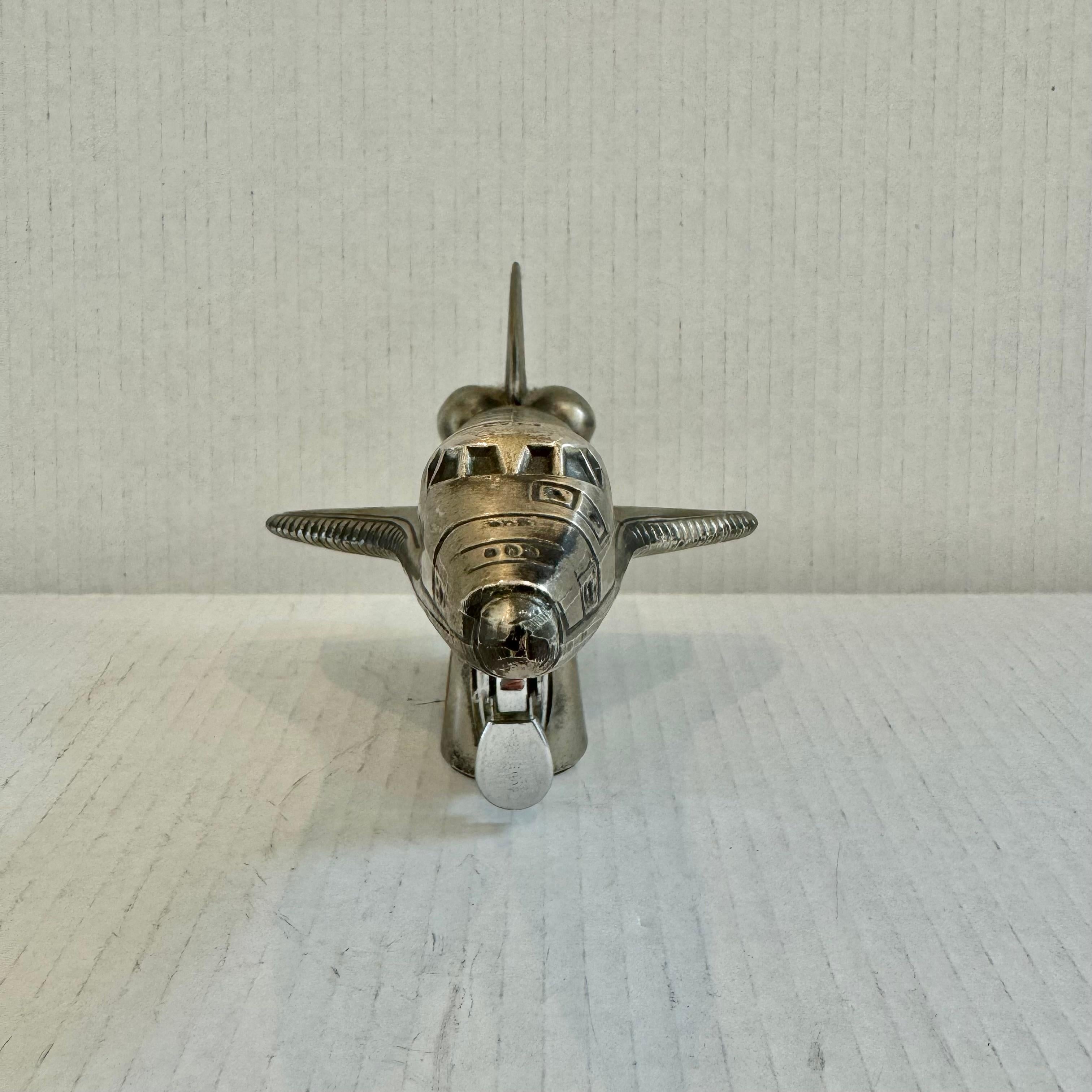 Cool vintage table lighter in the shape of a Nasa space shuttle. Made in Japan, 1980s. This piece has great balance and details. Cool tobacco accessory and conversation piece. Working lighter. Good vintage condition.

Located in our Los Angeles