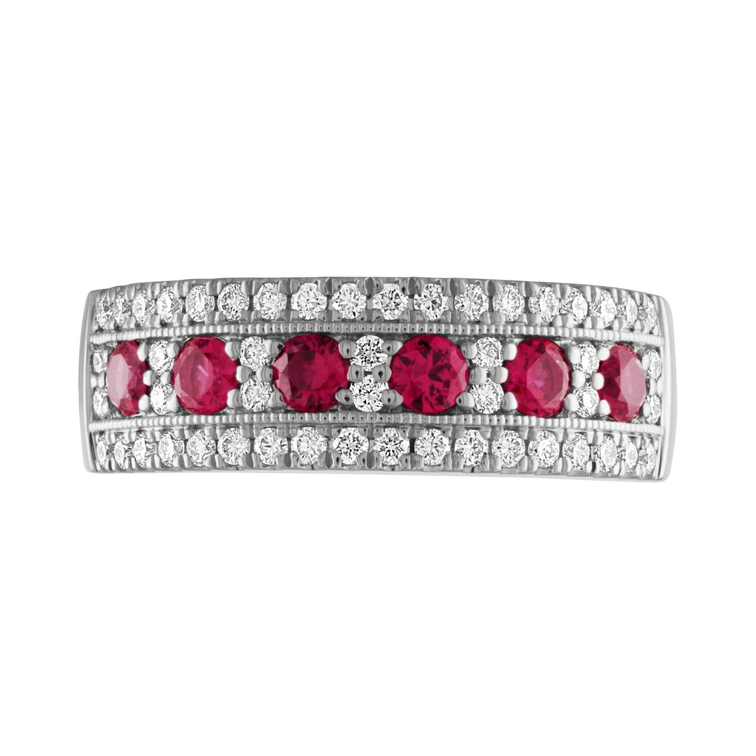 This classy and timeless band features 6 beautiful and sparkly rubies.  The rubies are surrounded by shiny brilliant cut diamonds.
Metal:  14k White
Rubies:  6 round rubies = .59ctw.  (2.70mm each)
50 round diamonds = .42ctw.  G, VS2 grading.
Finger