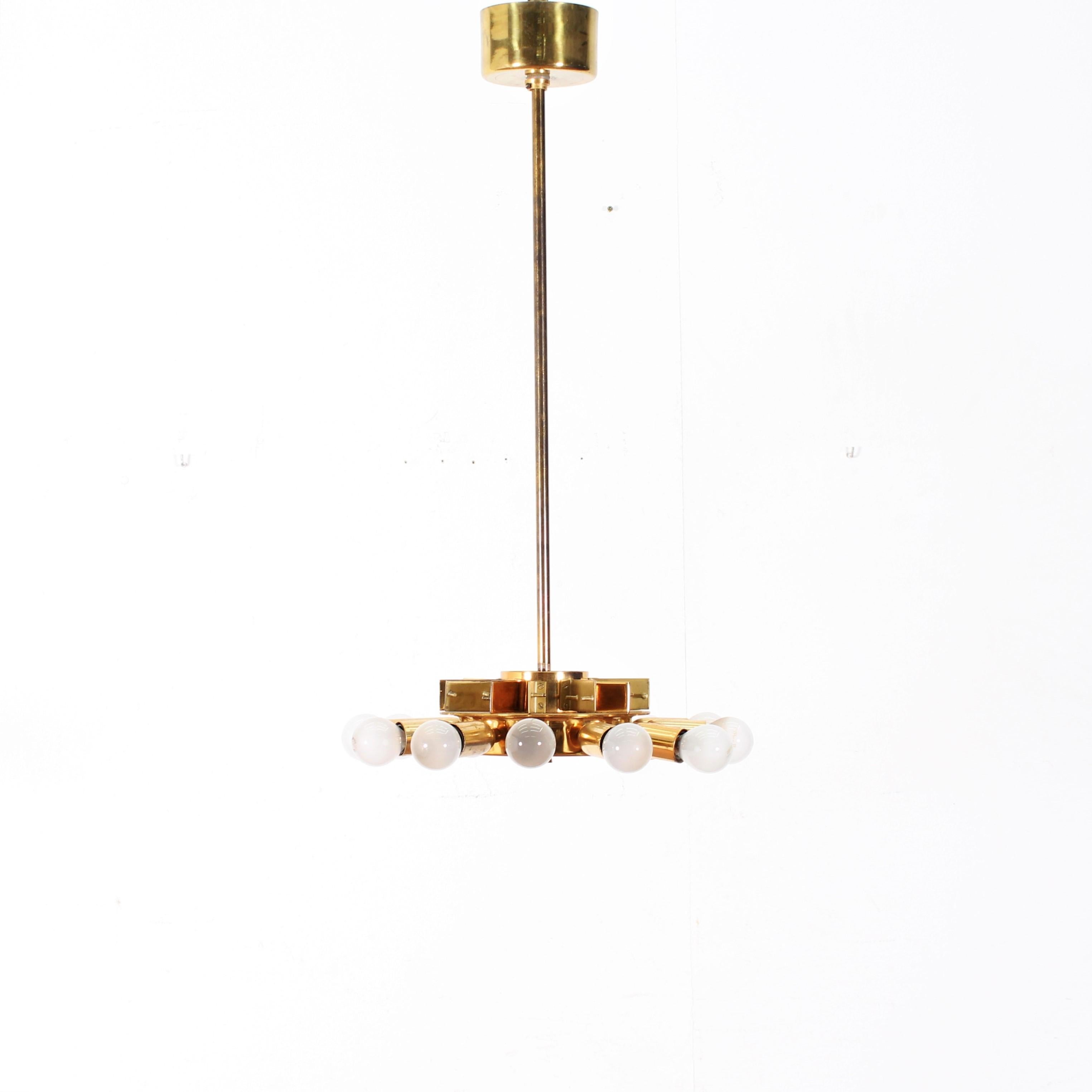 Amazing and huge chandelier with brass structure and blue cut crystal elements arranged like flower petals, by Gino Paroldo, 1960s, Italy.
12-light spots with E14 lamp socket (LED lamps with E14 socket are easily found online, perfectly working