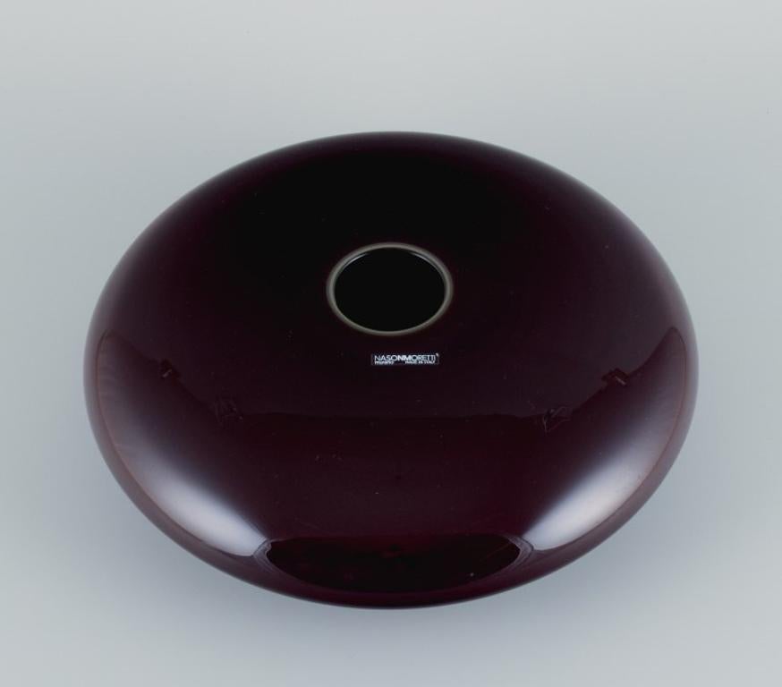 Nason Moretti for Murano, Italy.
Large modernist vase in art glass. Low and round shape. 
Burgundy coloured.
2000s.
In perfect condition.
Dimensions: D 30.0 x H 10.0 cm.
