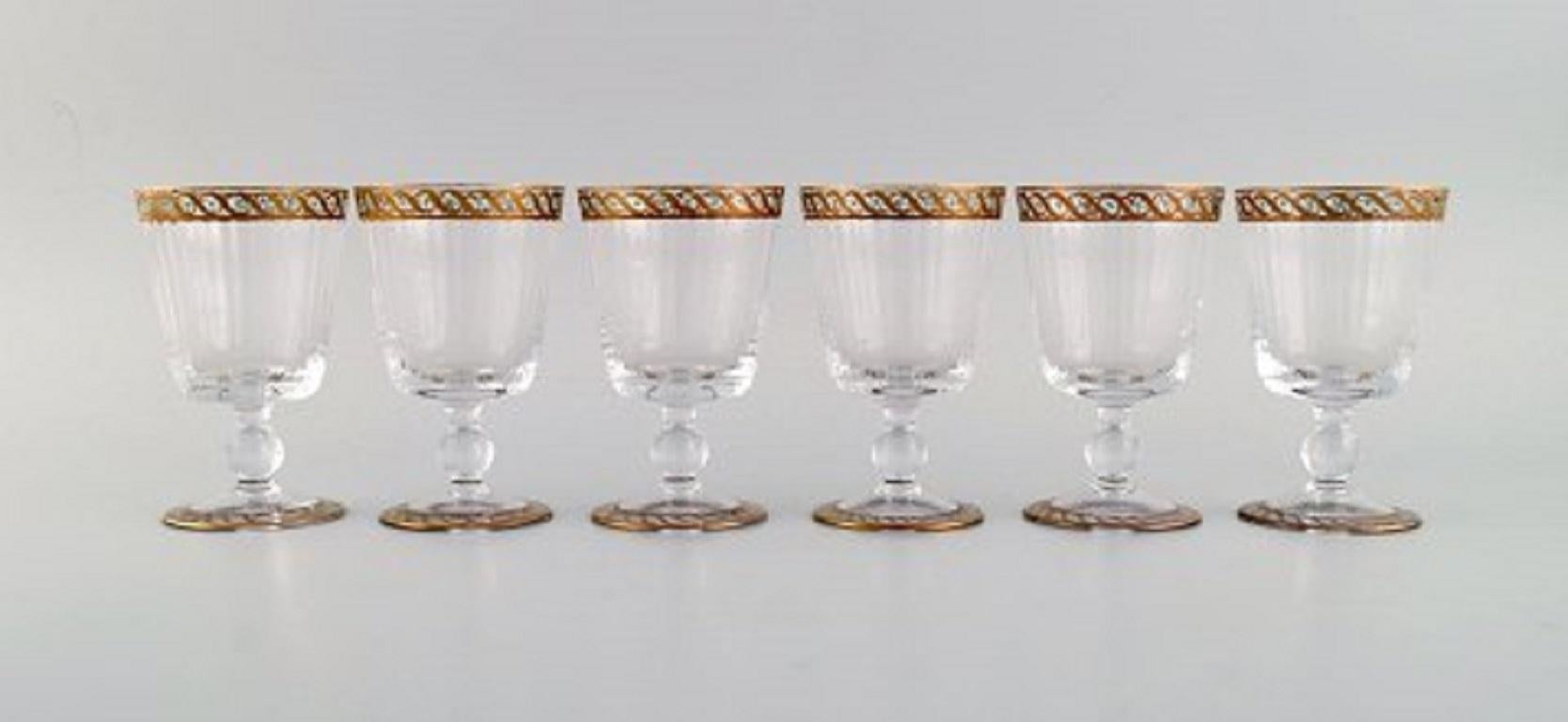 Nason & Moretti, Murano. Six white wine glasses in mouth-blown art glass with hand-painted turquoise and gold decoration. 1930s.
Measures: 11.3 x 7 cm.
In excellent condition.