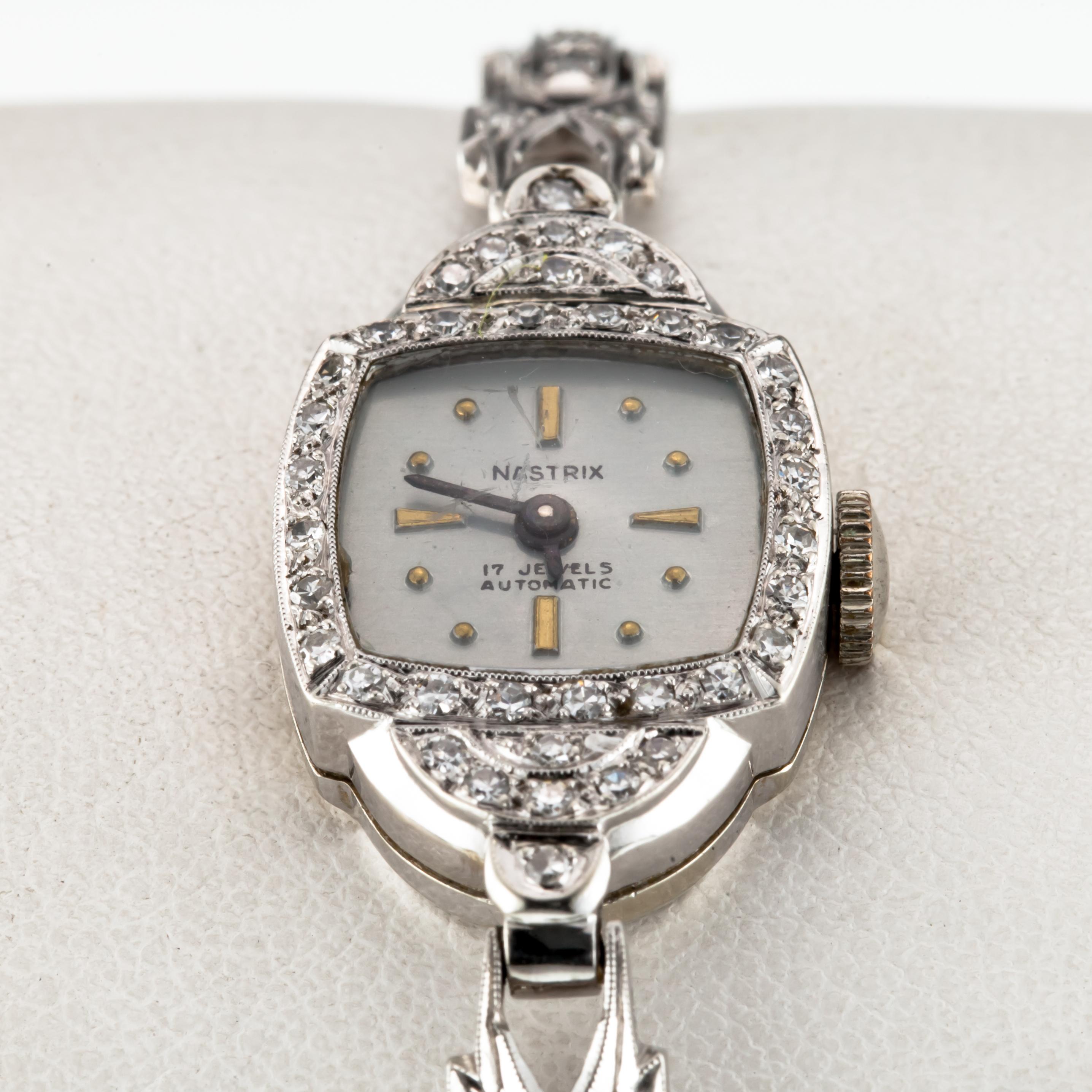 Taille ronde Nastrix Montre habillée à remontoir à la main en or 14 carats et platine avec bracelet en diamants pour femmes en vente