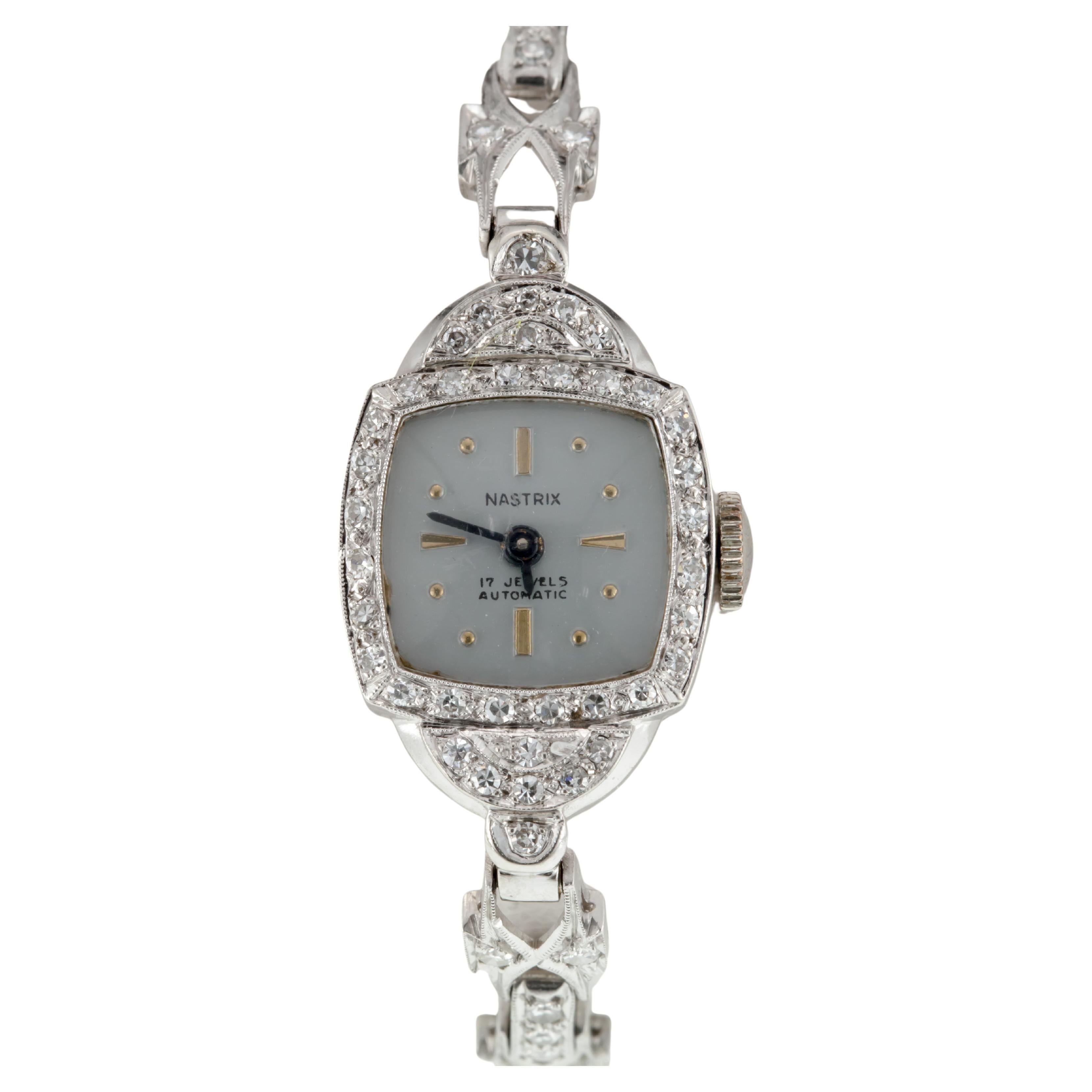 Nastrix Montre habillée à remontoir à la main en or 14 carats et platine avec bracelet en diamants pour femmes