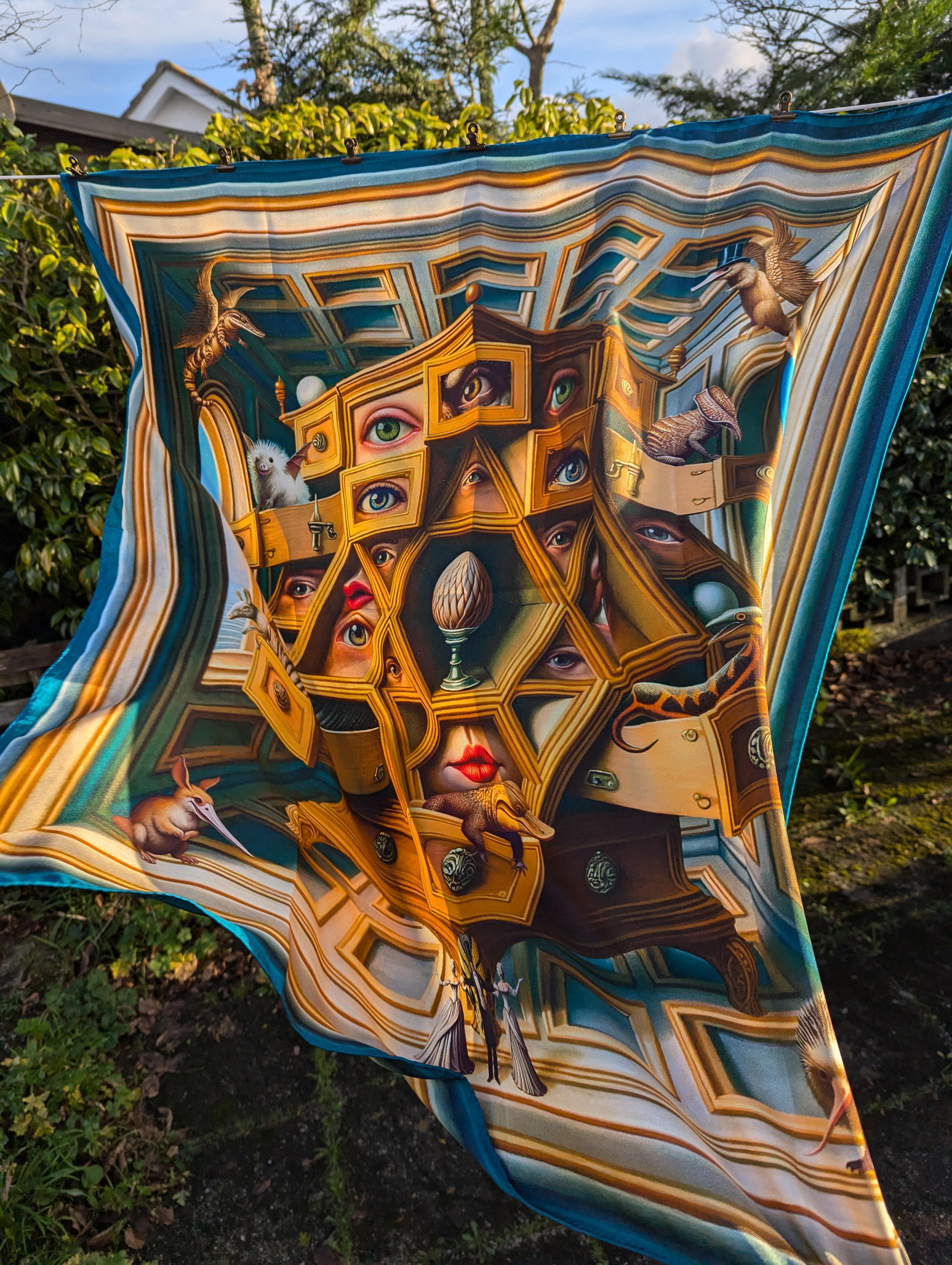 The artwork is print on silk and it is limited edition.

A stunning exploration of memory, legacy, and hidden worlds, 