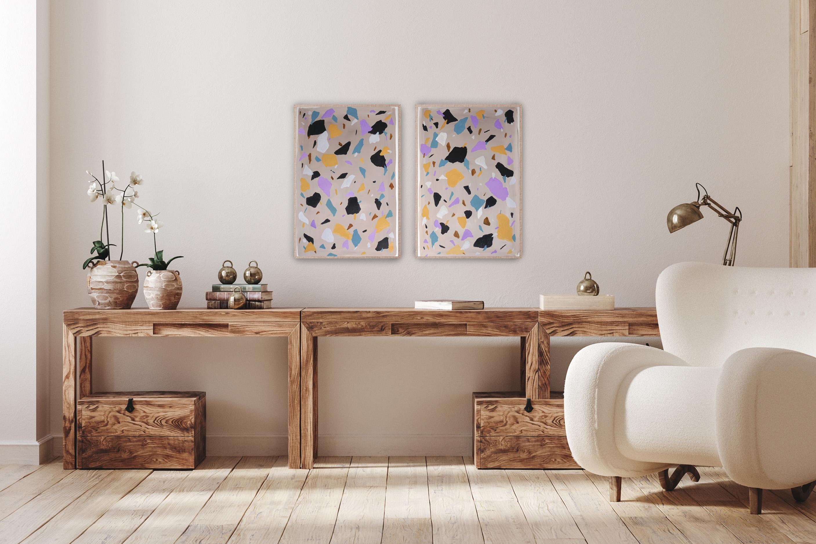 This series of hand painted acrylic paintings by Natalia Roman are inspired by the colors and textures of Italian terrazzo tiling. The patterns created combine a variety of vivid colors in the foreground with subtle background tones, painted on a