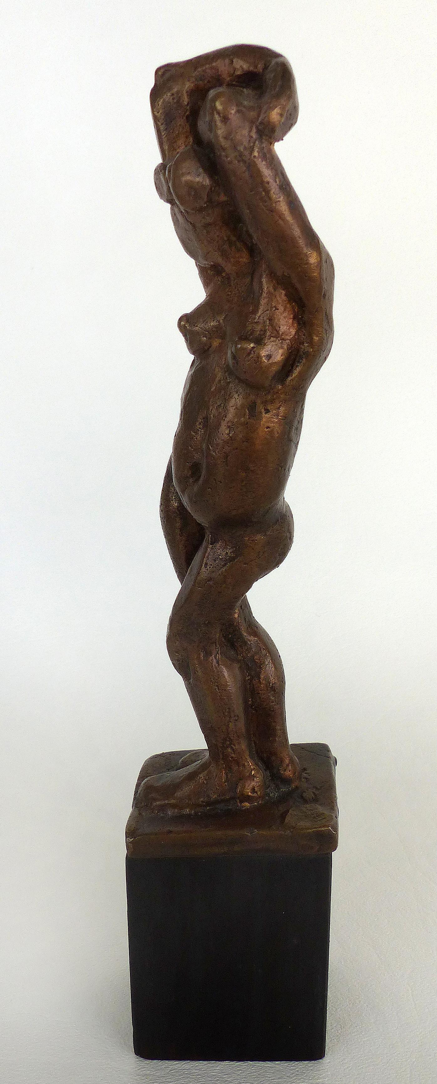 Natalie Charkow Hollander Bronze Nude Sculpture

Offered for sale is a figurative bronze standing nude sculpture raised on a wood base by Natalie Charkow Hollander signed and dated 1981. Signed to the base of the sculpture. Natalie Charkow Hollander