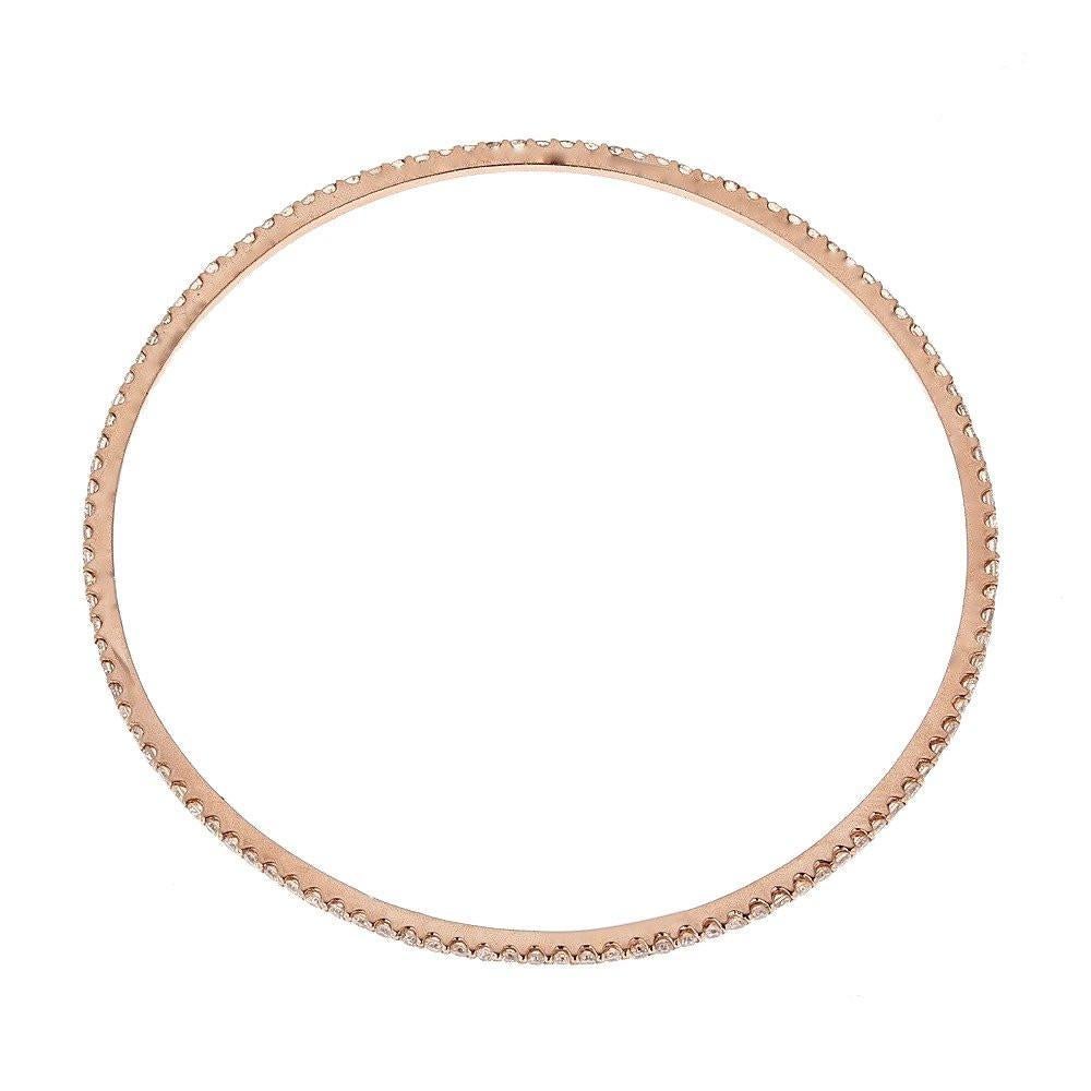 Natalie K. 14 Karat Rose Gold 2.0 Carat Diamond Pave Designer Bangle Bracelet

Perfect gift. Show off your affection with this tennis bracelet. This dazzling eternity diamond bracelet is crafted in sleek 14k Yellow Gold. 2 TCW of high-quality round