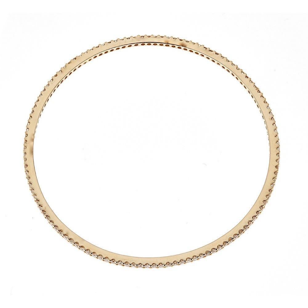14 Karat Yellow Gold Diamond Pave Designer Bangle Bracelet By Natalie K.

Show off with this dazzling eternity diamond bracelet. Set in 14k Yellow Gold. A round set of diamonds are set in a prong setting, creating a dramatic look. Polished to a