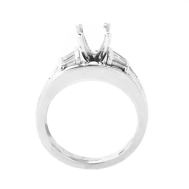 The minute you lay eyes on this bridal mounting set from Natalie K you'll absolutely fall in love with its sophisticated design. The rings are made of 14K white gold and feature shanks set with ~.50ct of diamonds.
