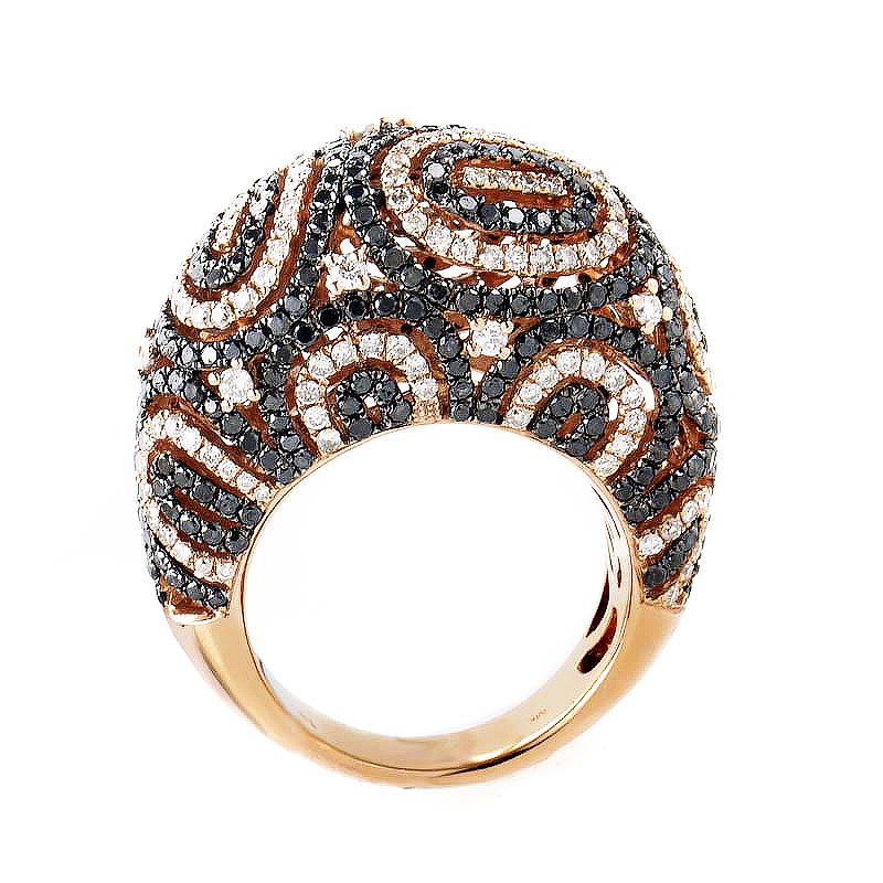 This vibrant design from Natalie K is artistic and will truly stand out in a crowd. The ring is made of 18K rose gold and is set with ~3.45ct of black and white diamonds.
