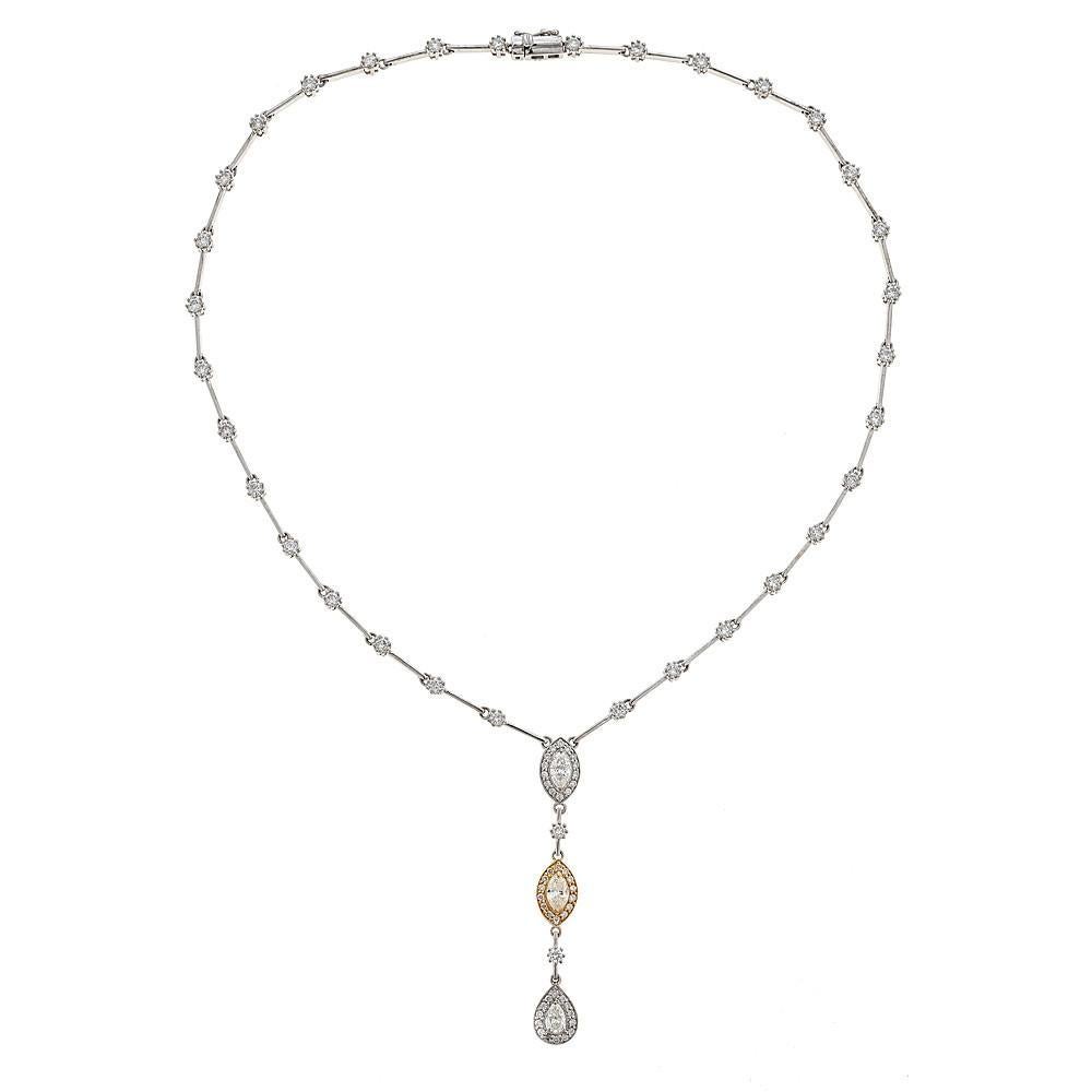 This elegant necklace from renowned designer Natalie K. is handcrafted in 18K two-tone gold and comes with over 4 carats in round brilliant diamonds.