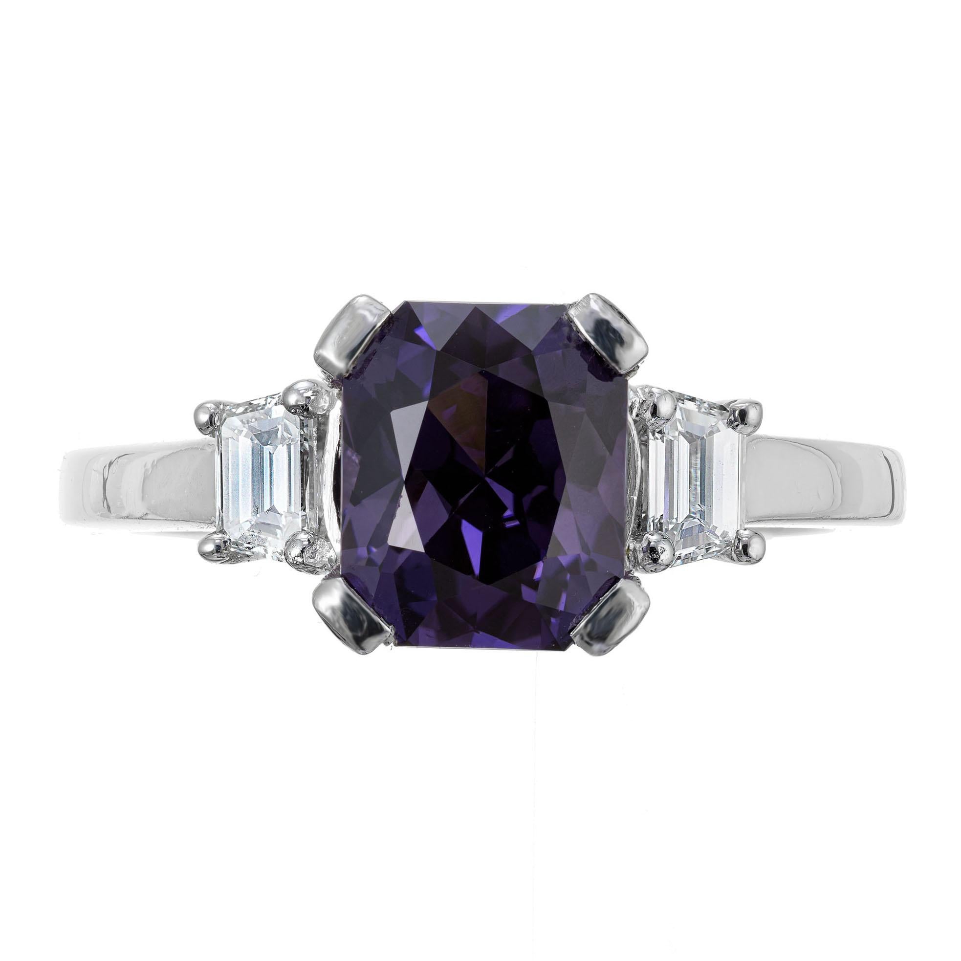 Natalie K sapphire and diamond engagement ring. GIA certified 3.33ct deep rich purple all natural untreated center Sapphire, in a platinum setting with 2 trapezoid side diamonds and 22 round full cut diamonds.  
 
1 octagonal cut purple sapphire,