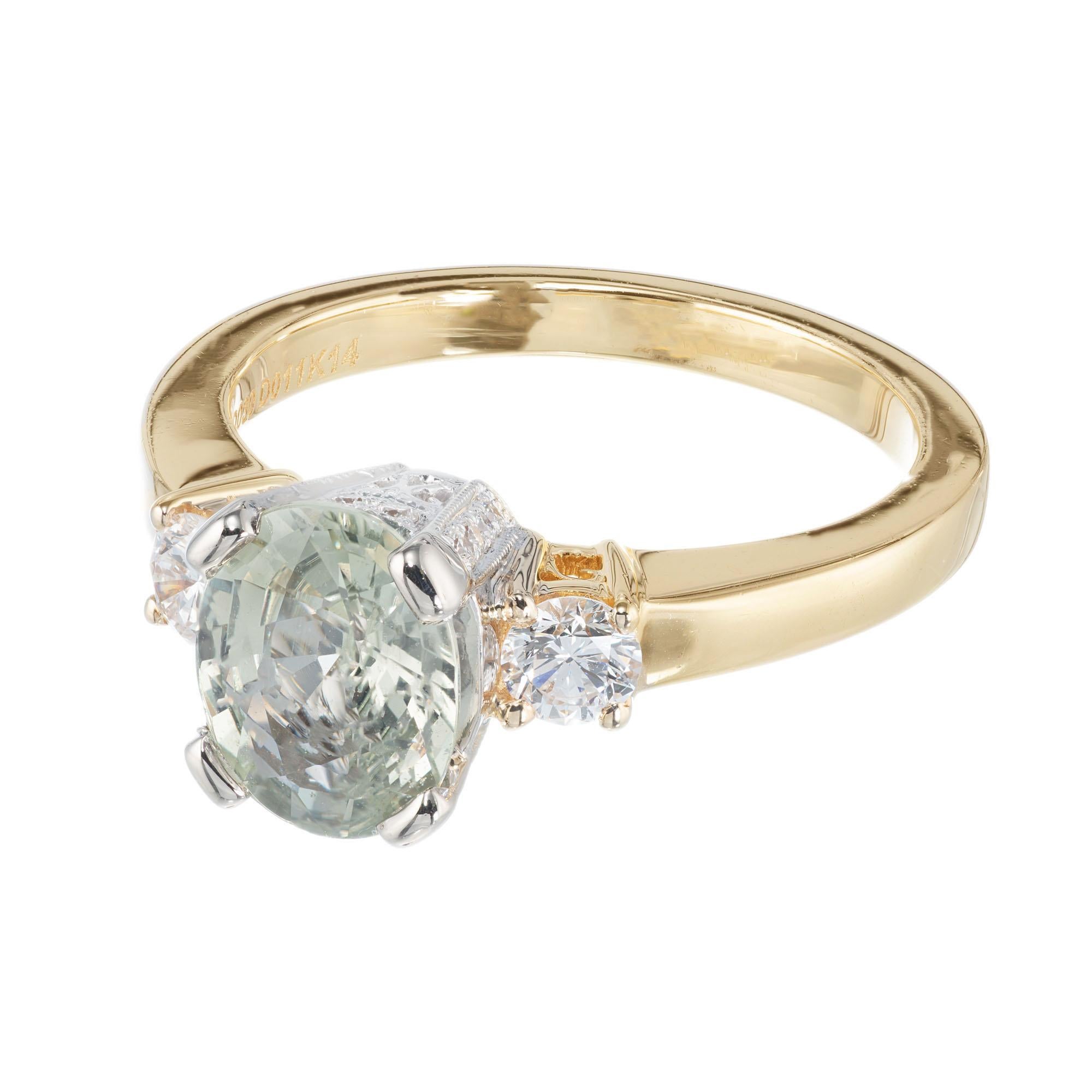 Natural green Sapphire engagement ring with yellow and grey overtones. GIA certified no heat no enhancements. Natalie K designer ring.

1 oval light yellowish green Sapphire, approx. total weight 1.83cts, VS, natural no heat, GIA certificate