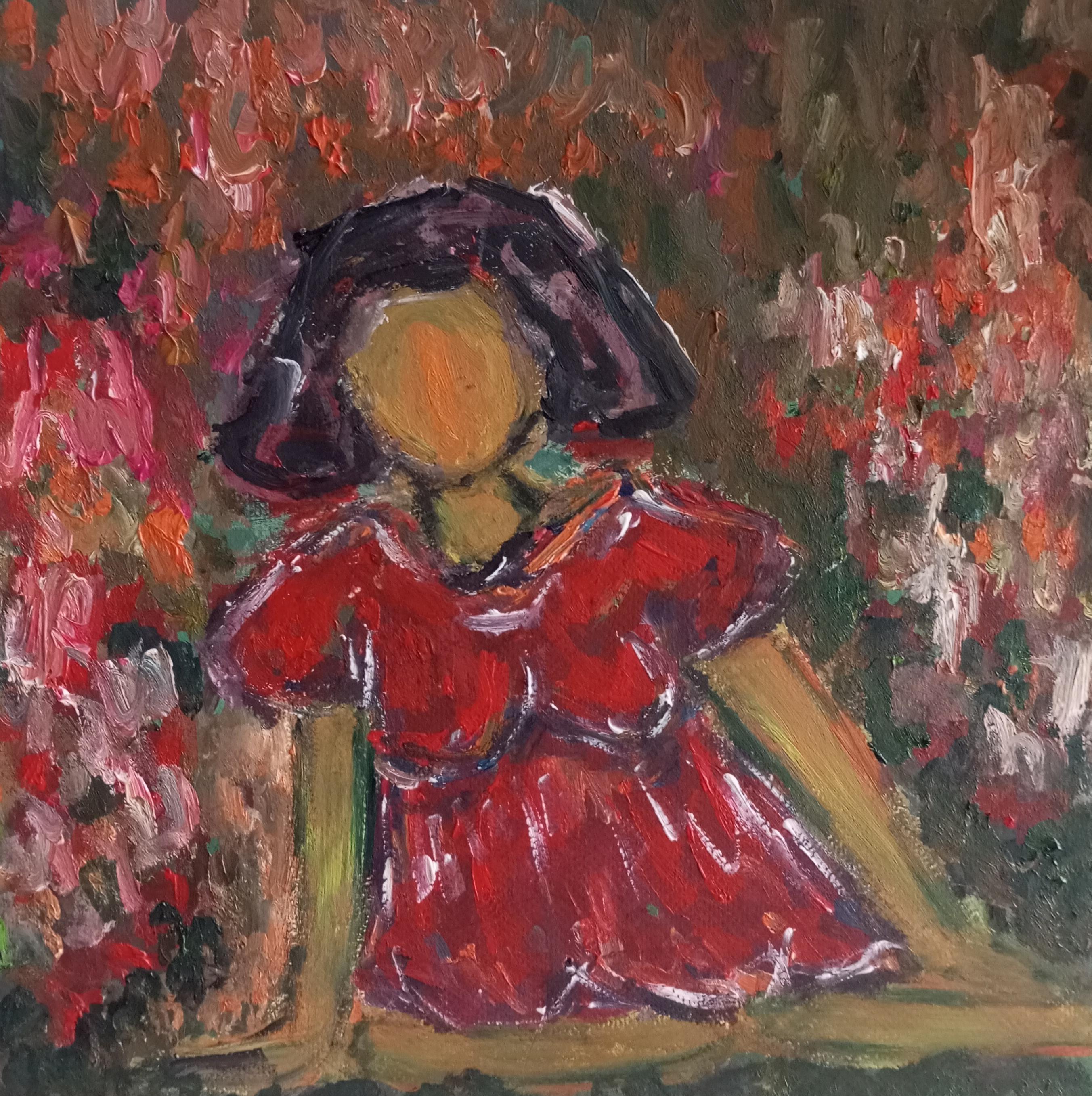 "Woman in a red dress in the garden full of roses"