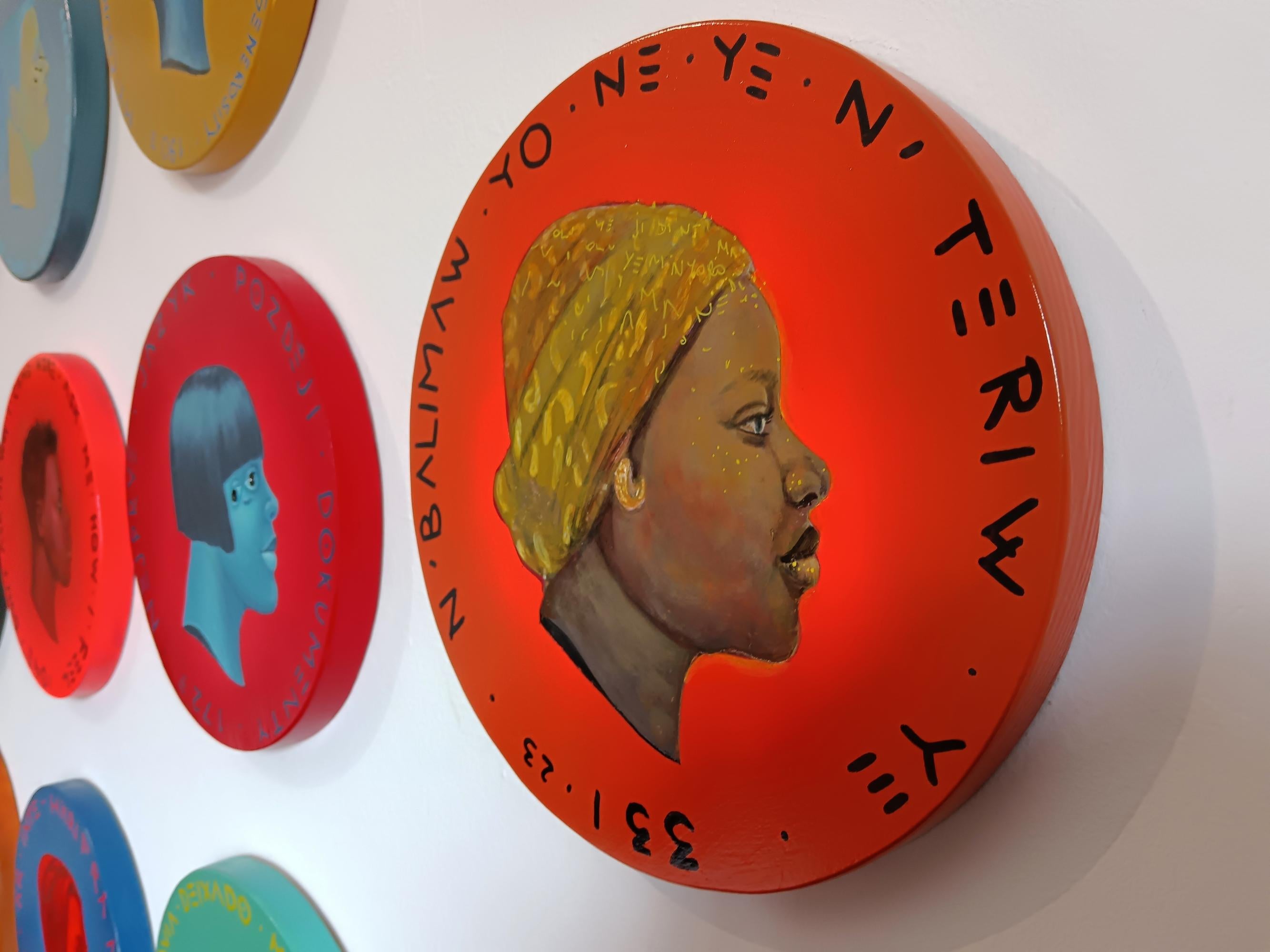 African Woman Profile Colorful Portrait on Wooden Coin. Orange 