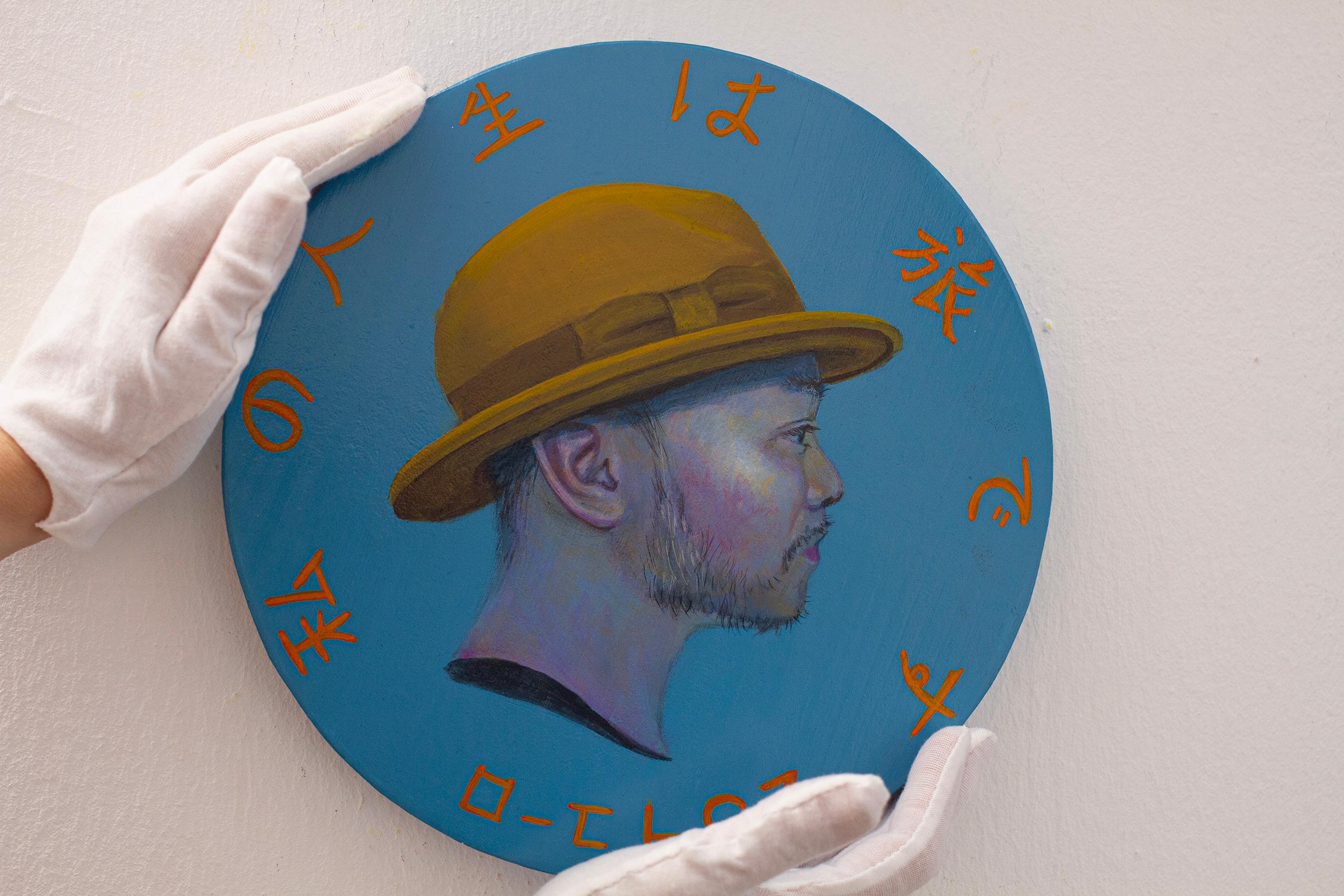 Contemporary Male Portrait on Sculptural Wooden Coin. Japanisch. 