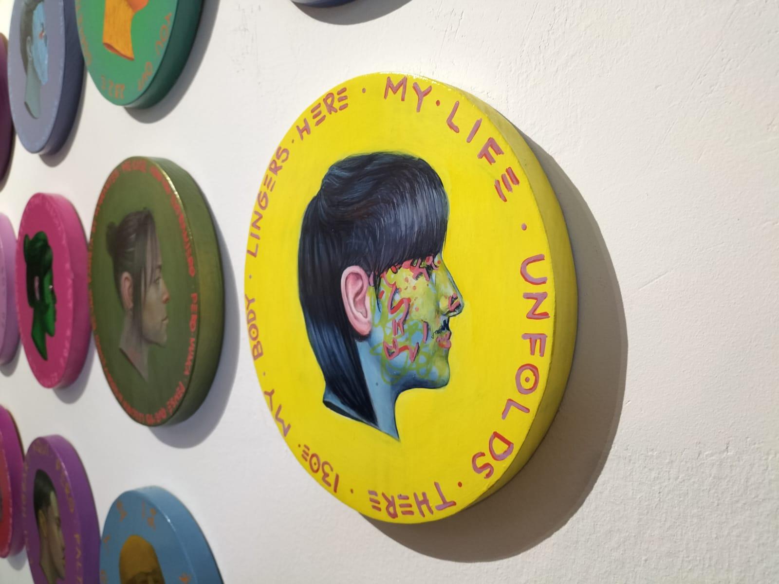 This original circular portrait painting is part of Natasha Lelenco’s Currencies series and features a hyperrealistic female profile against a vibrant yellow background. Titled Currency #130, the piece combines figurative painting with symbolic