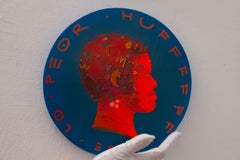 Textured Red Urban Face Portrait on Deep Blue Wooden Coin.  "Currency #244"