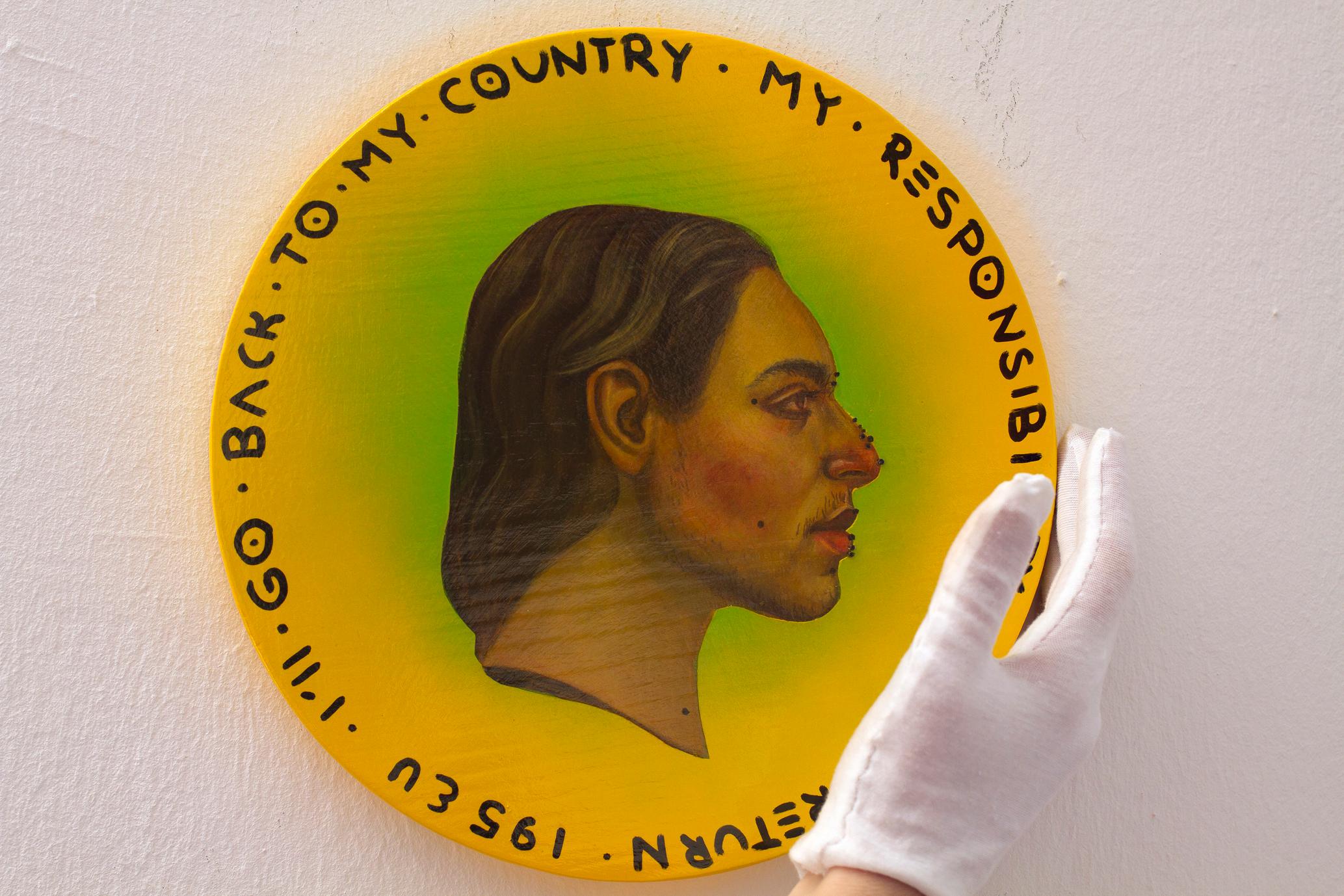 Yellow and Green Fluor Coin. Side Profile Male Portrait On Wood. 