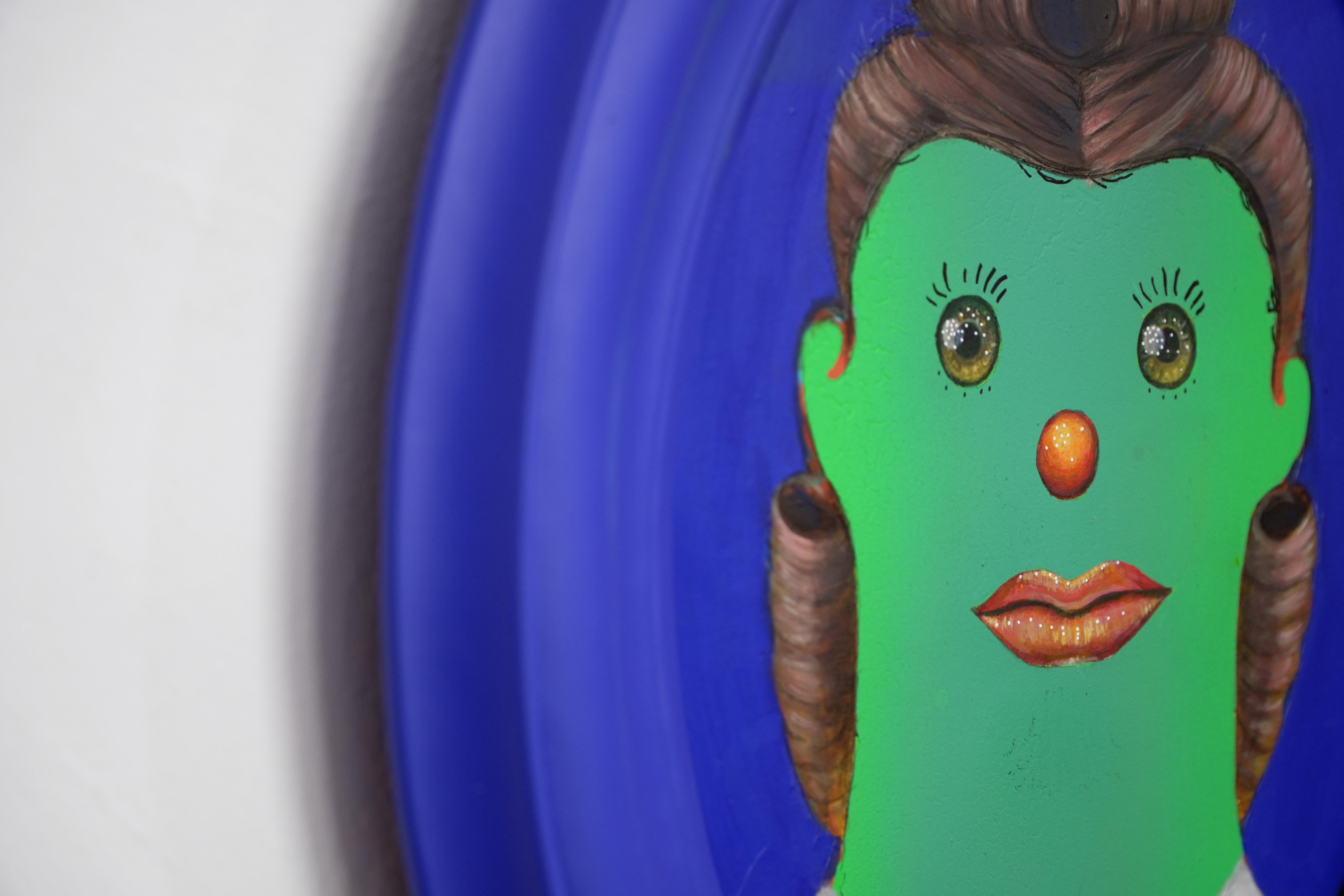 Ancestor Clone #11. Small Format Naïve Funny Portrait with Blue Oval Frame - Pop Art Painting by Natasha Lelenco