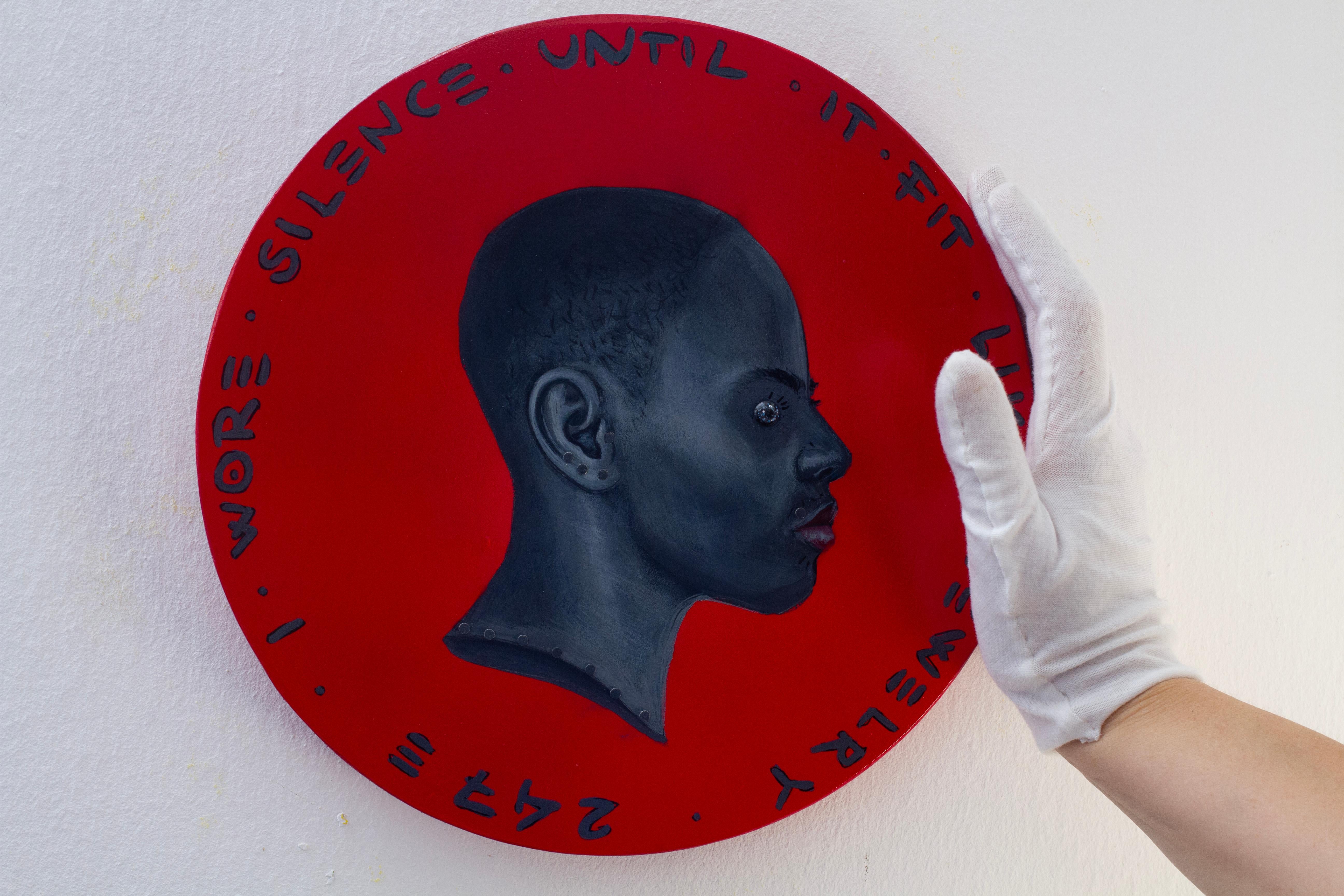 Black Female Portrait on Red Wood Background with English Text, 