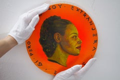 Currency #222: Orange Painted Coin with Face of a Cuban Woman About Foreignness