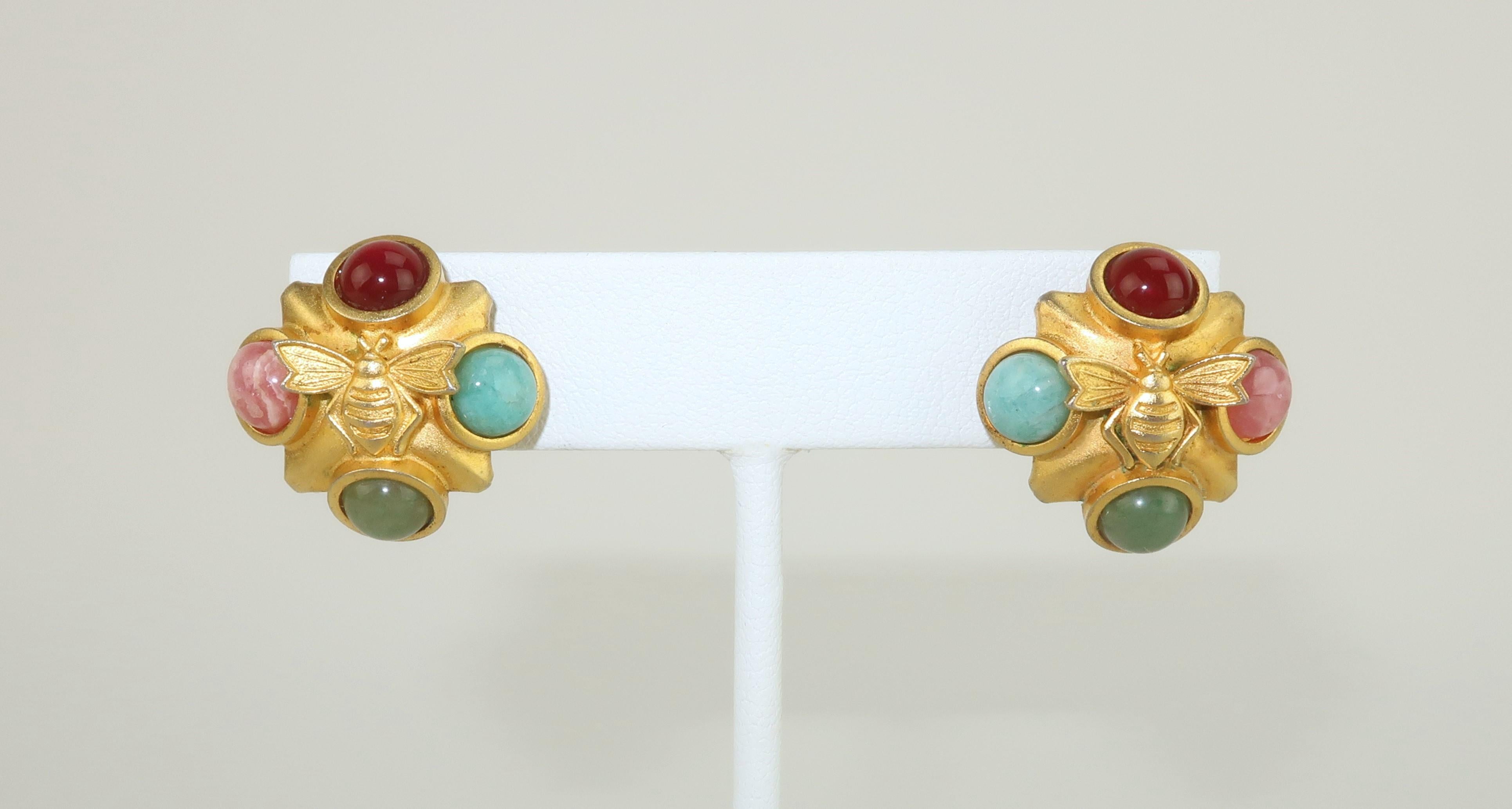 Natasha Stambouli's glamorous jewelry creations are made with a nod to the past including Etruscan, Byzantine and Neoclassical styles.  These petite earrings are gold plated metal with a matte finish embellished by semi-precious stones and outfitted