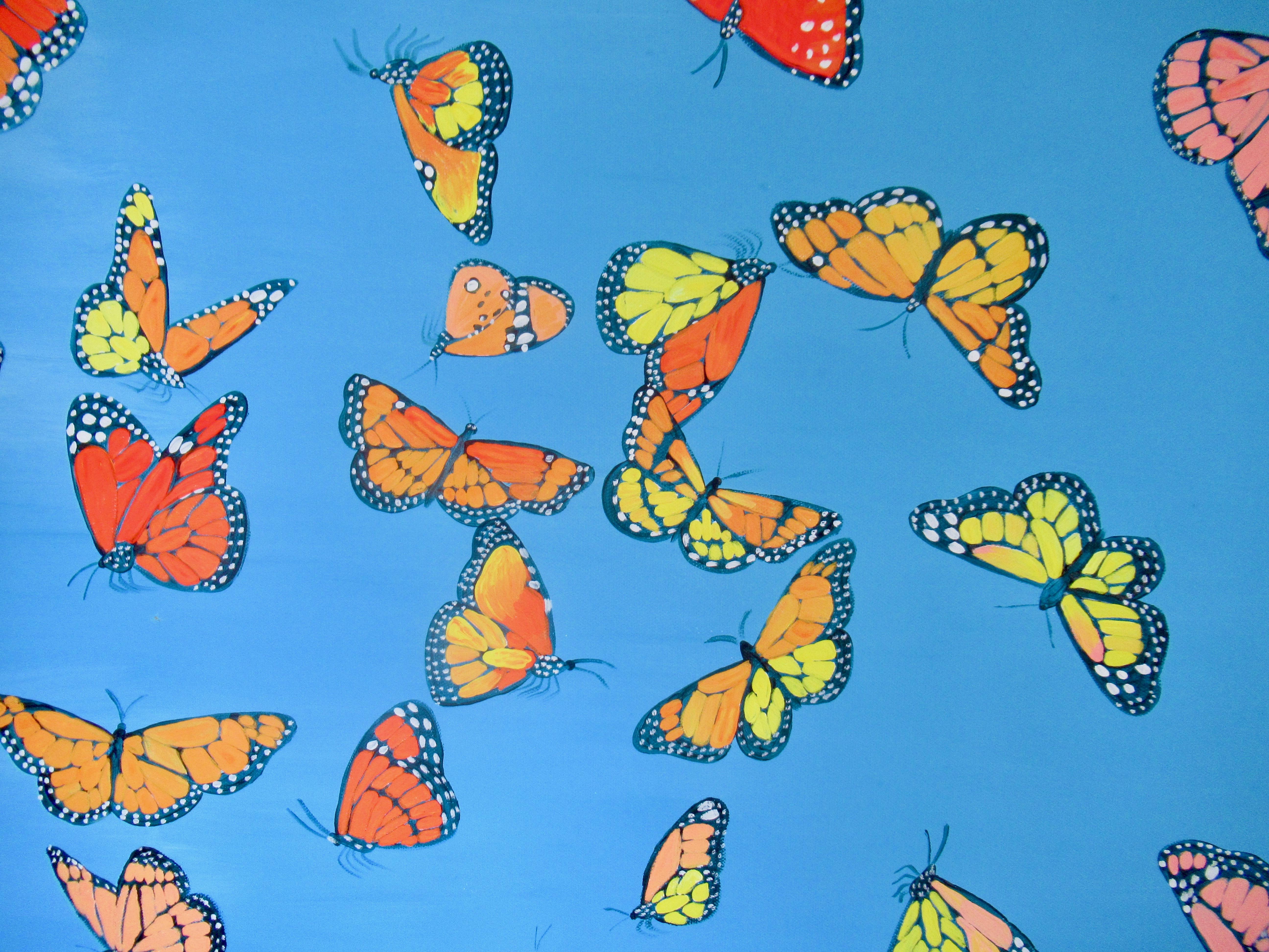 <p>Artist Comments<br />Monarch butterflies in pink, yellow, orange, and red fly around on a serene background of blue. Their wings fluttering in every direction. Part of a mini-series by artist Natasha Tayles.</p><br /><p>About the Artist<br