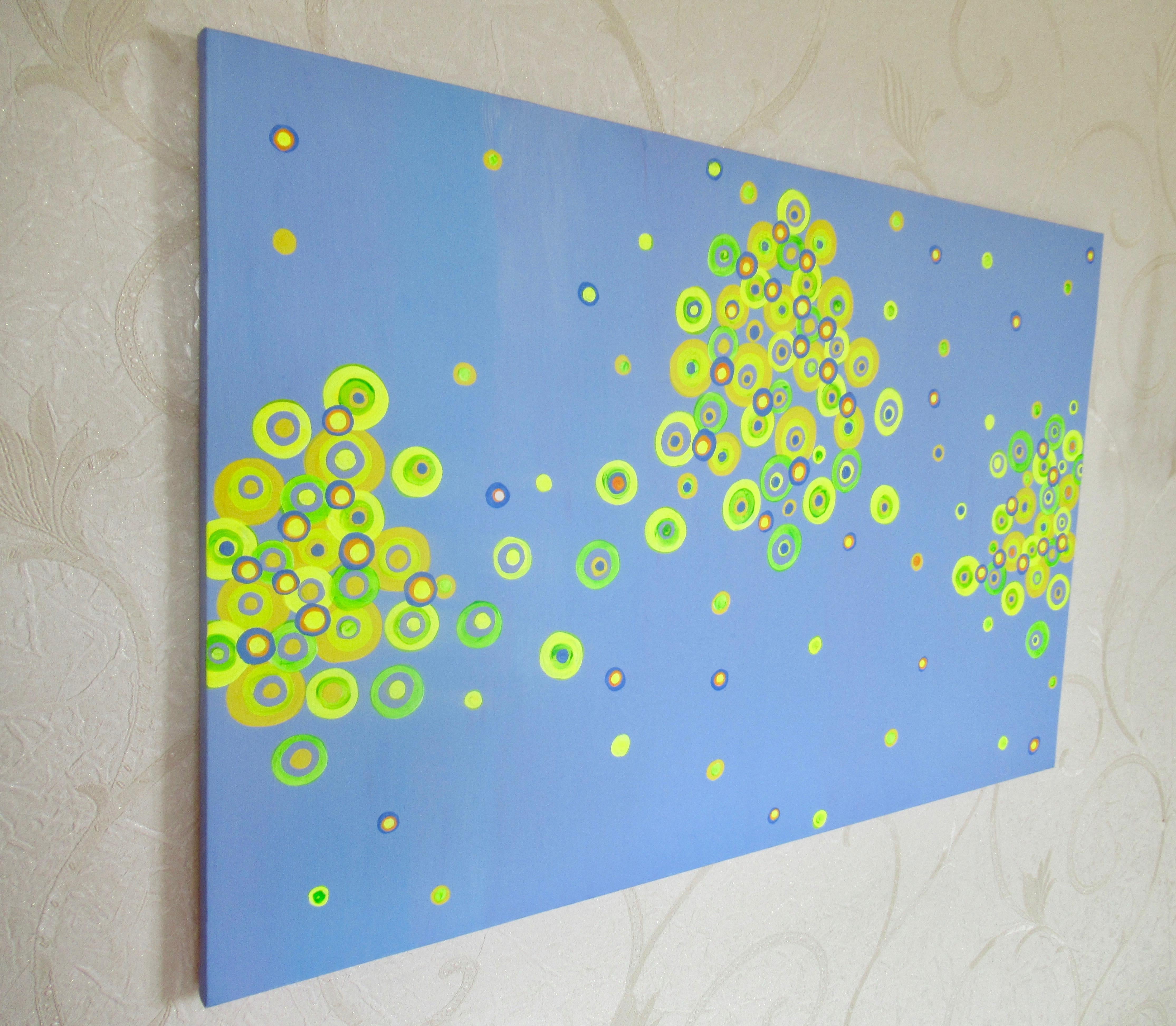 <p>Artist Comments<br />Happy-looking yellow-green orbs float merrily on a blue background, drifting along with the soft wind. Part of artist Natasha Tayles signature Circles series created with charming color combinations.</p><br /><p>About the