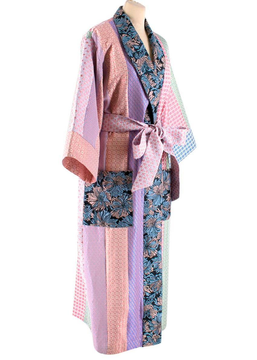 Natasha Zinko Patterned Patchwork Kimono. RRP £785.00

- Patchwork kimono with belt
- Long 3/4 length
- 2 large pockets at the front

Materials:
- Patchwork fabric: Polyester blend
- Lining: 100% Polyester
- Dry clean only

Made in Poland

Please