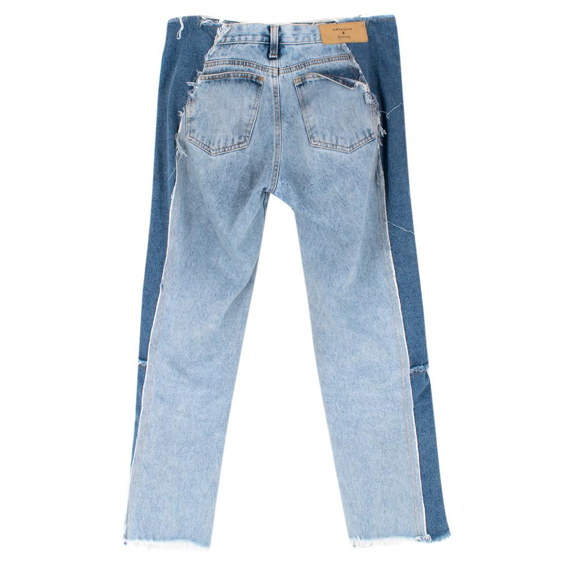 Natasha Zinko Two-Tone Distressed Cropped Jeans

- Two-tone blue denim jeans
- Cropped
- Straight cut
- Distressed
- Printed Russian script at left front pocket reading 
